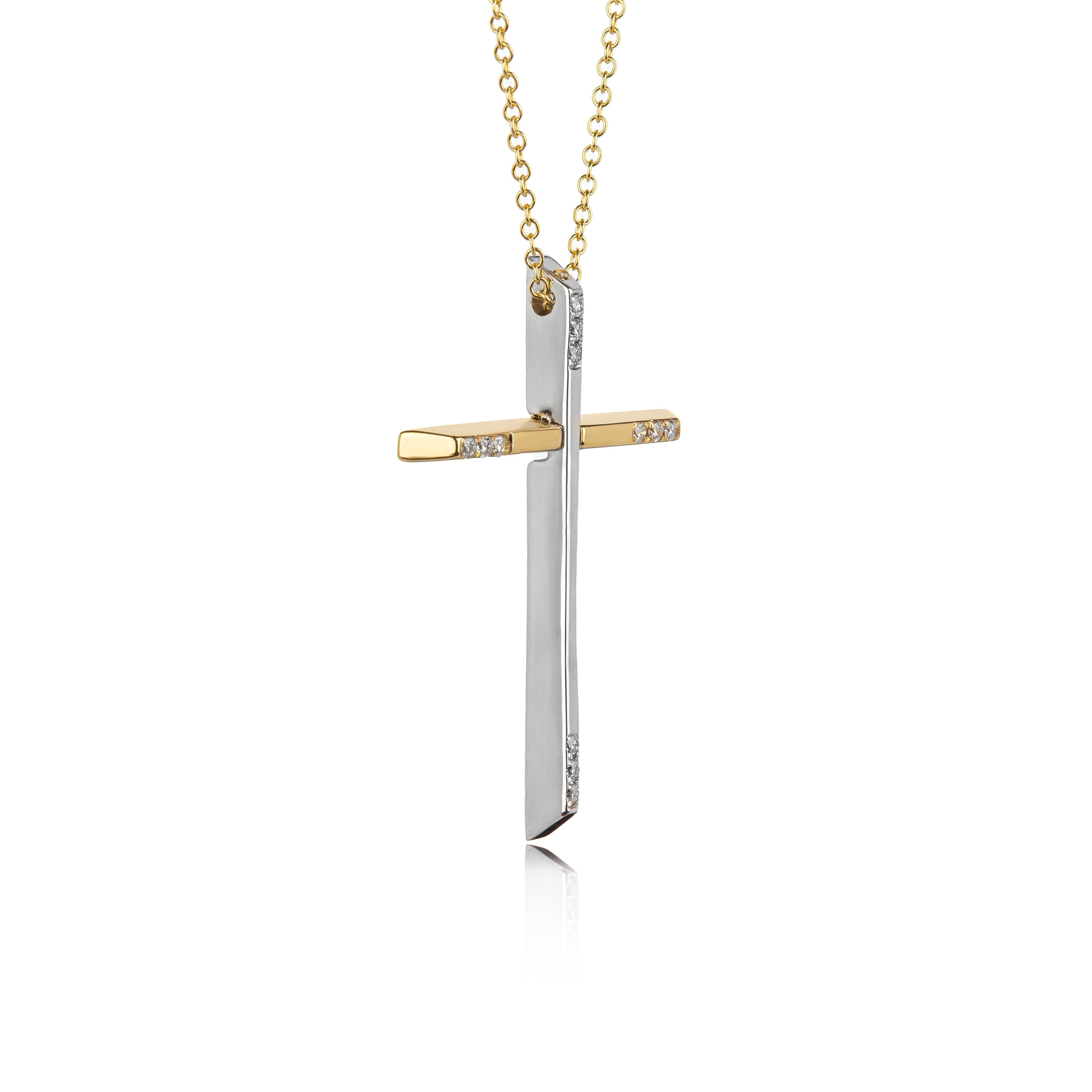 Cross and chain in yellow and white Gold 18Kt decorated with 12 Diamonds Brilliant Cut
The diamonds are 0.040ct  and the chain is rolo style.
The cross has two colors, white gold in horizontal  dimension and yellow gold in the vertical dimension.
It