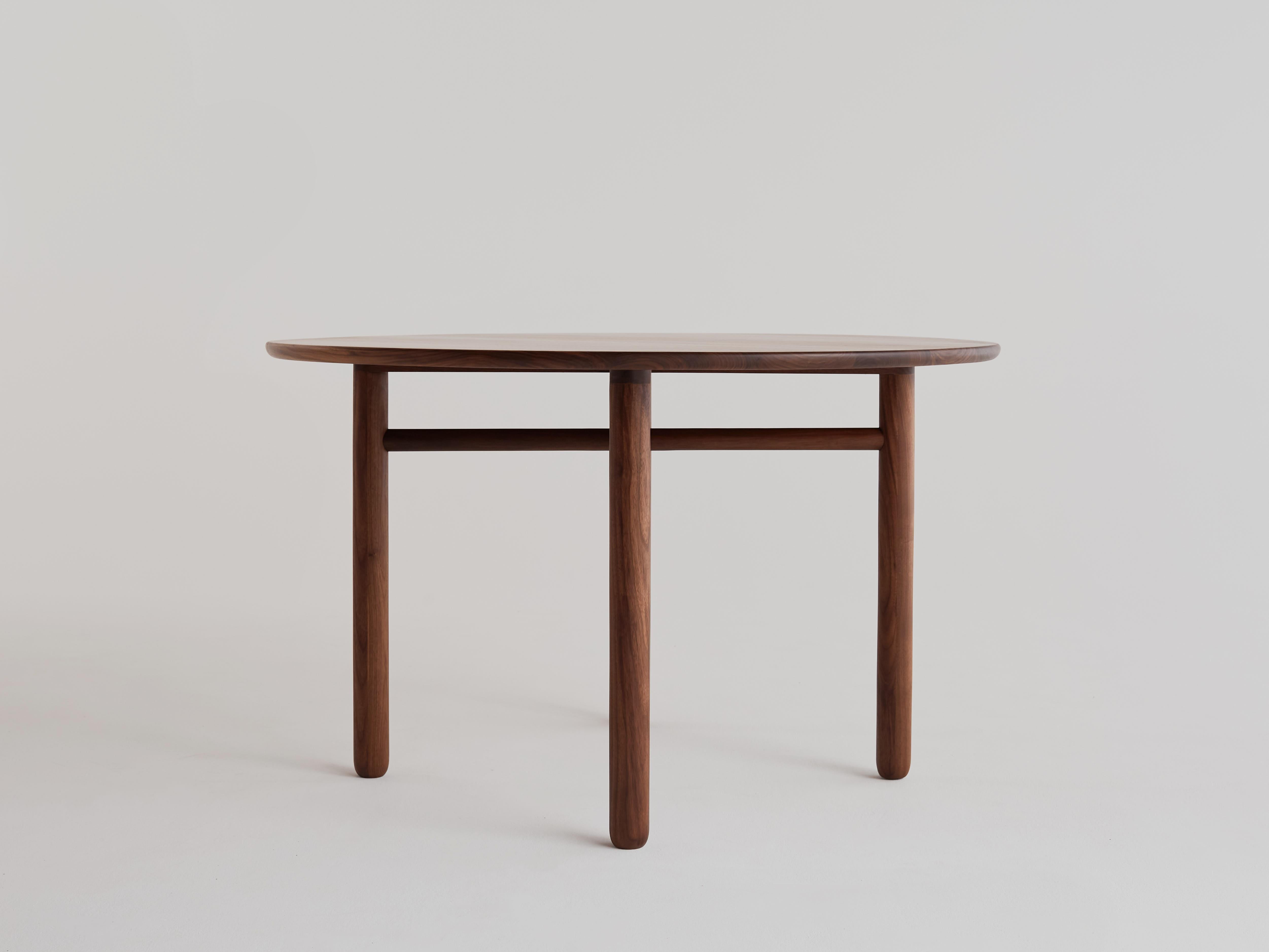 minimal round dining table