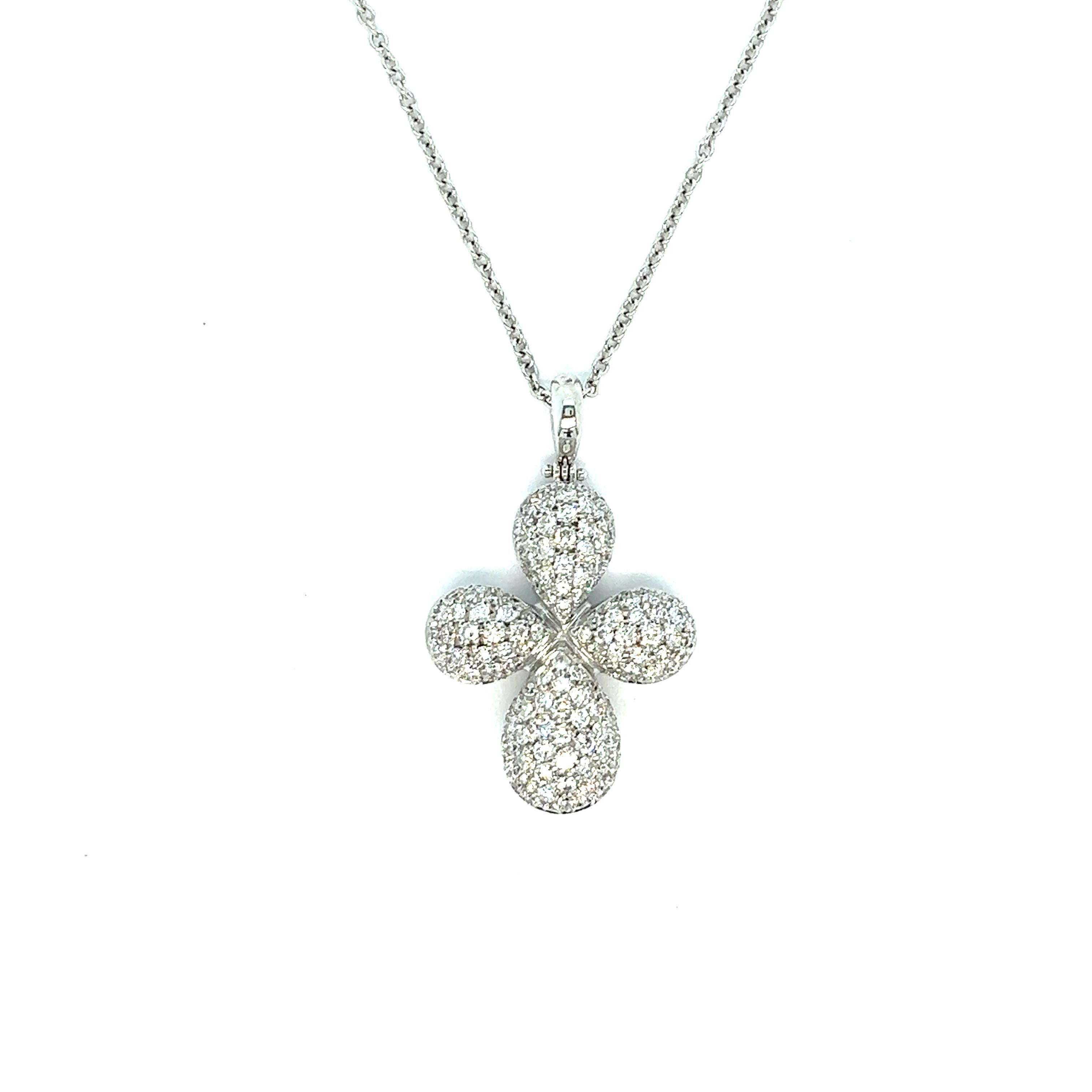 Cross diamond pendant necklace, made in Italy

Round-cut diamonds of 1 carat, 18 karat white gold, cross motif; marked 750

Size: pendant width 0.94 inch, length 1.5 inches; chain length 16.31 inches
Total weight: 14.5 grams