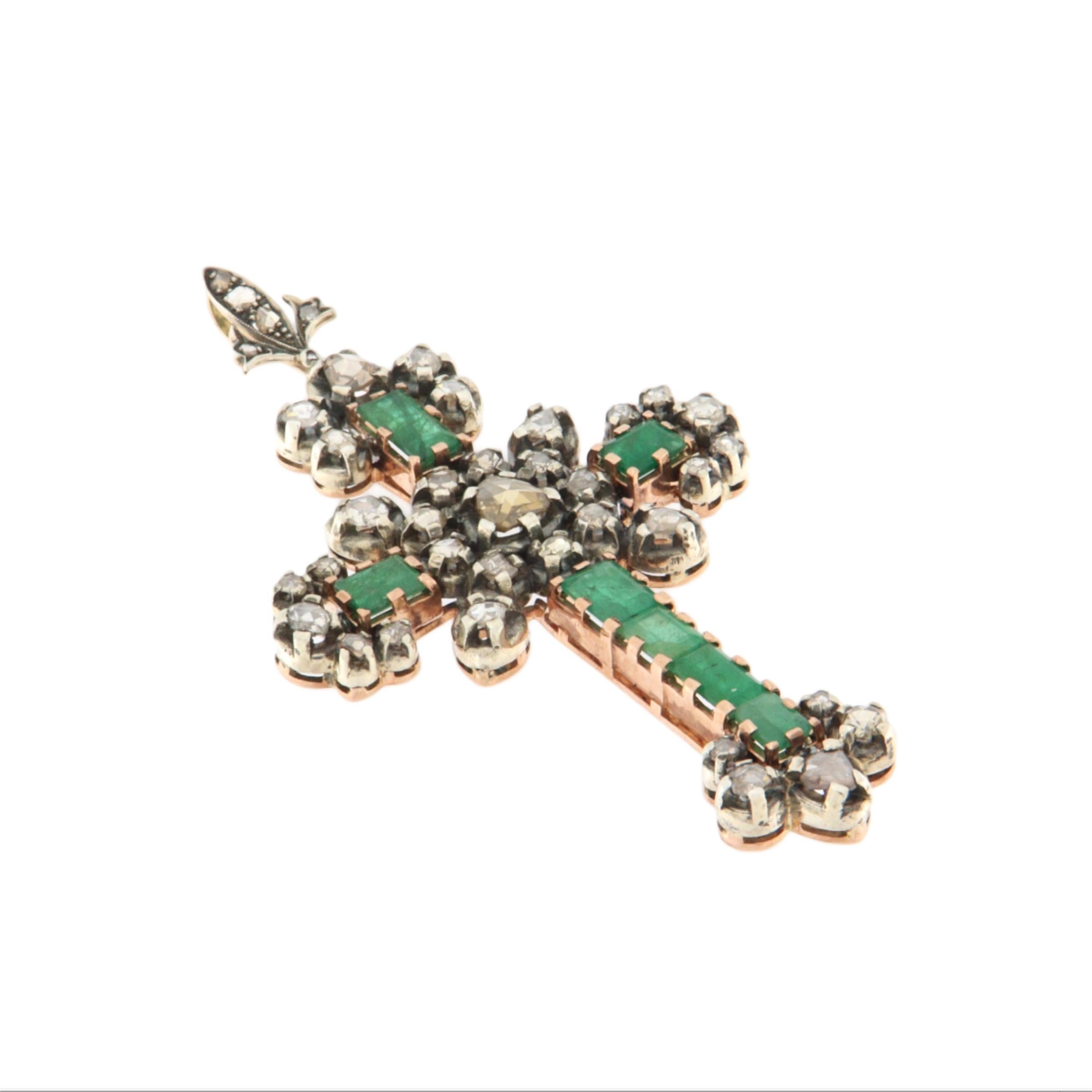 A rare and refined piece, this antique cross pendant dates back to the 1700s and stands as a remarkable example of 18th-century craftsmanship and religious artistry. Handcrafted in 9-karat yellow gold and 800-grade silver, this pendant embodies the