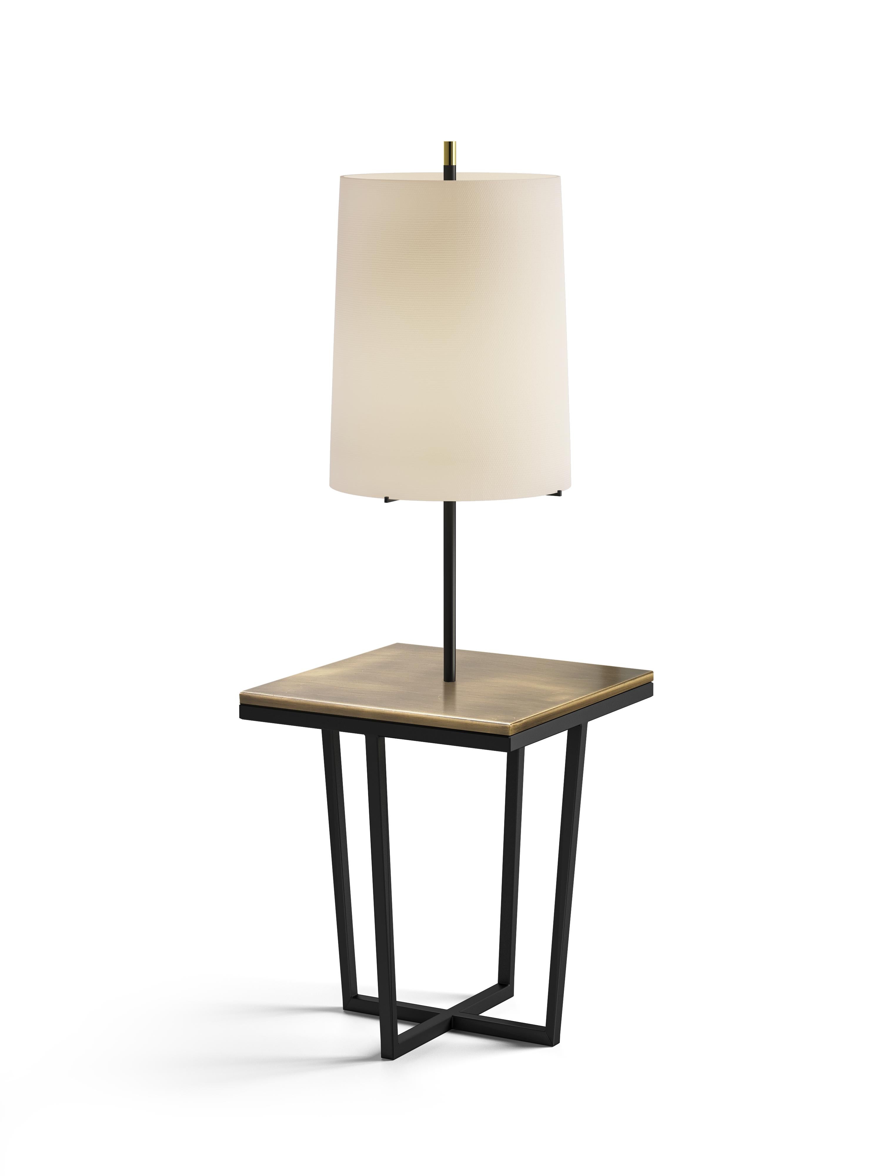 Cross Floor Lamp by DUISTT
Dimensions: W 50 x D 50 x H 154 cm
Materials: Black Iron and Brass

CROSS lamp, crafted with great attention to detail, is a piece with a base in a cross shape that combines understated chic design with a duality of