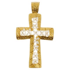 Cross in 19.2K Gold and pearls.