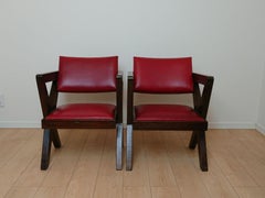 Paire de fauteuils à pieds croisés conçus par Pierre Jeanneret pour Chandigarh