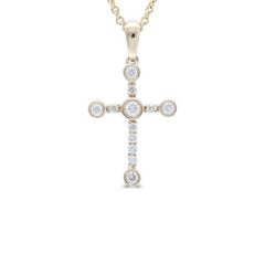 Colgante Cruz en Oro Amarillo de 14 quilates con Diamantes de 0,15 quilates