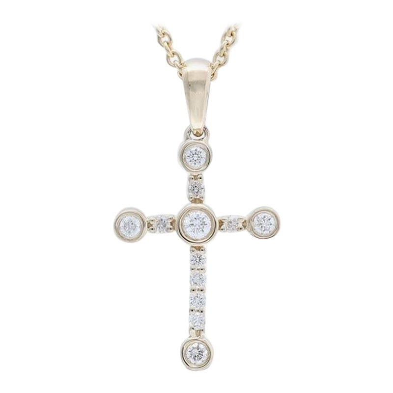 Cross-Anhänger aus 14 Karat Gelbgold mit 0,15 Karat Diamanten