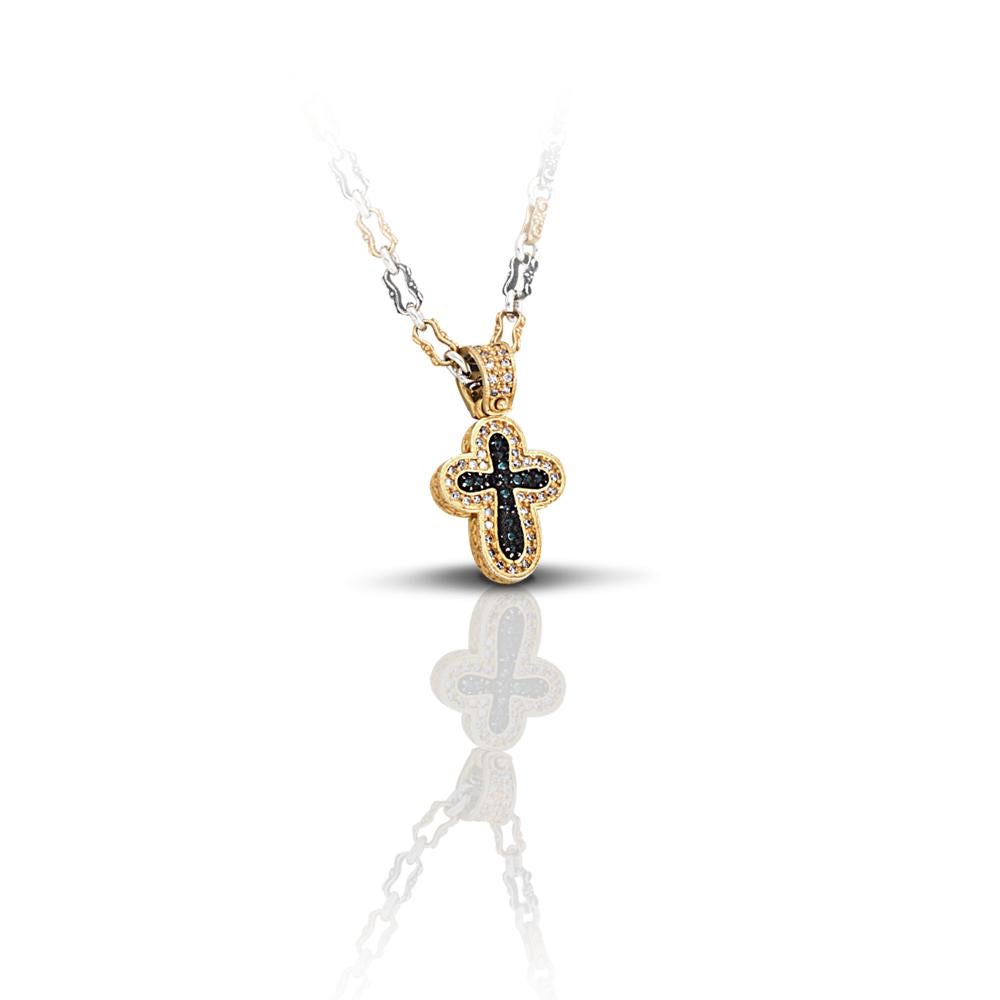 A delicate cross with zircon stones is always a timeless piece that every woman should have in her collection. 
Depending on the preferences of each one, the cross can be made in green, red or blue zircon stones. 
The pendant is perfectly combined