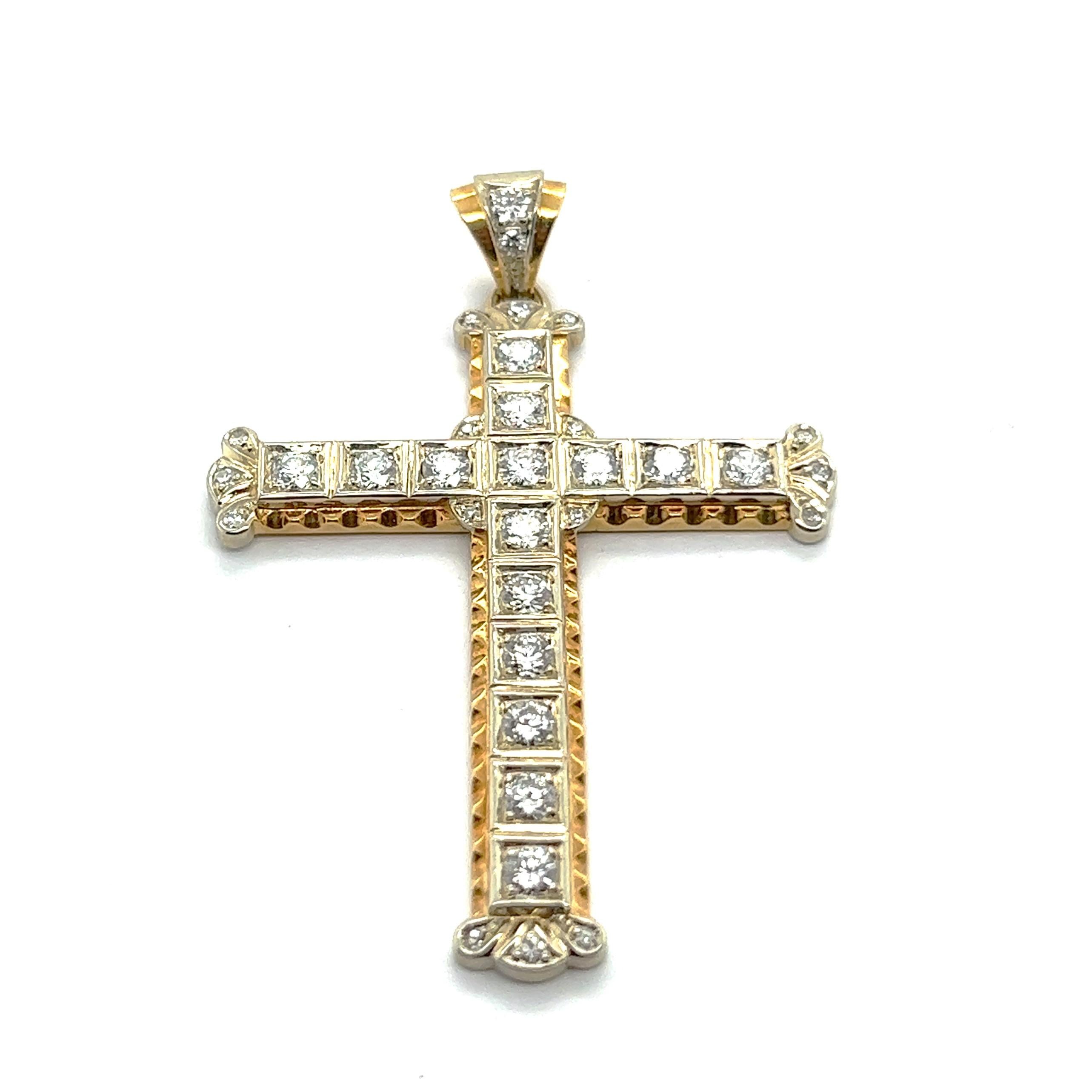 A cross pendant with diamonds, crafted in 18 Karat yellow and white gold , creating a simple yet meaningful piece. 

The 17 brilliant-cut diamonds totaling 1.10 carats give the piece elegance without being flashy. The center diamonds are