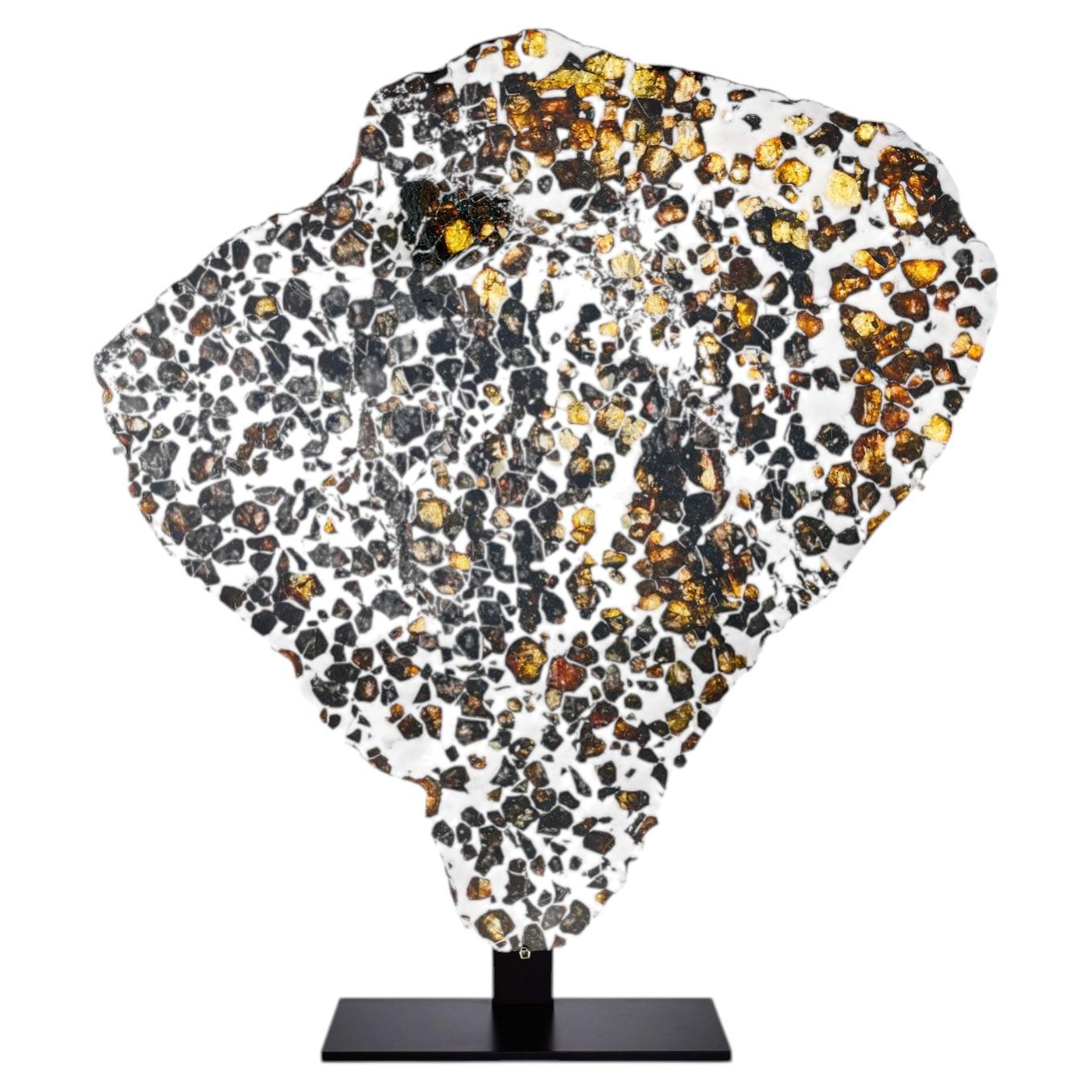 Cross-Section of the Seymchan Meteorite with Peridot Gems and Crystalised Metal