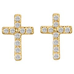 Clous d'oreilles en or jaune 14 carats avec diamants en forme de croix