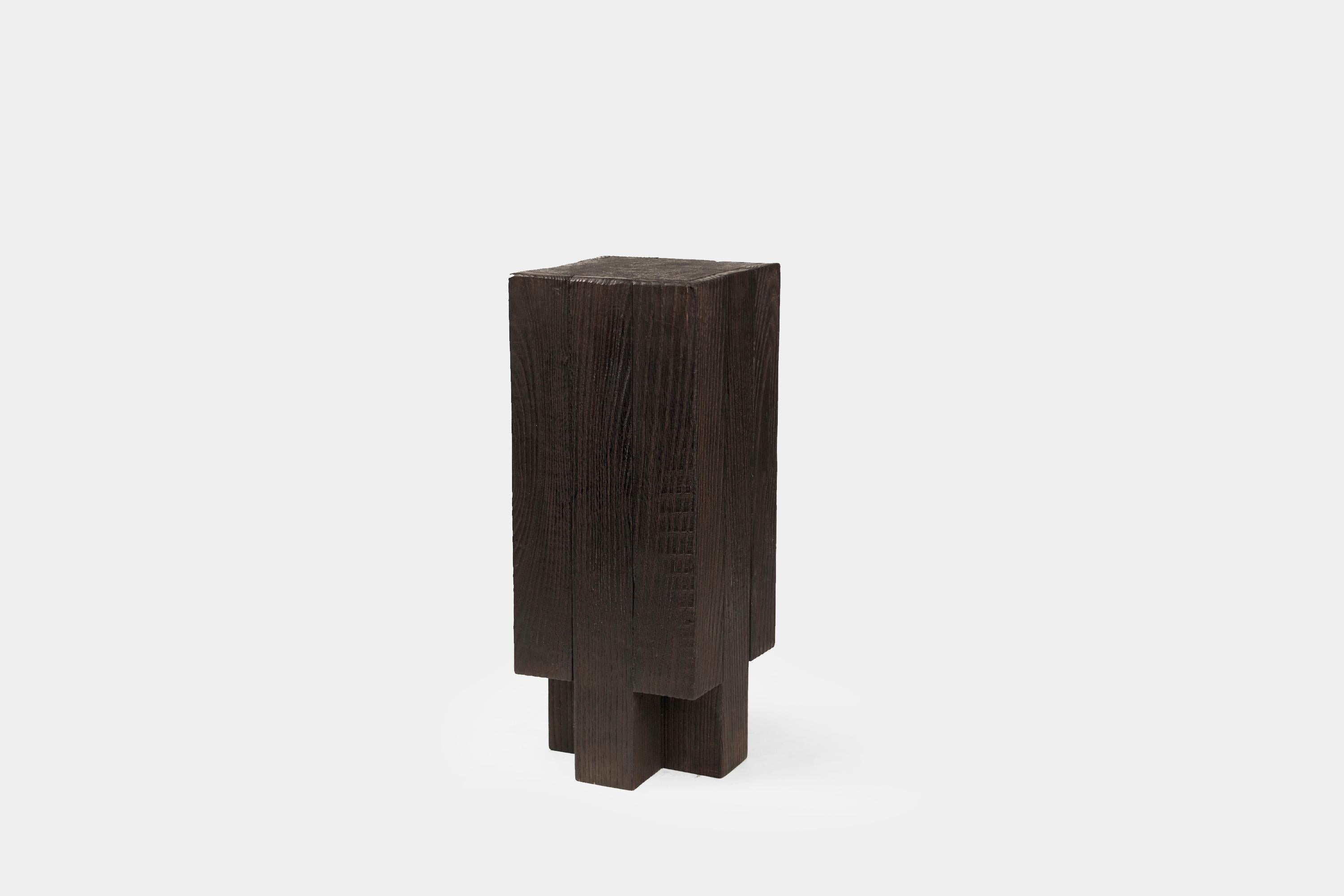 Black Bunker Side Table by Arno Declercq
Dimensions: D 21 x W 21 x H 50 cm. 
Materials: Burned and waxed Oak and burned steel.

Arno Declercq
Belgian designer and art dealer who makes bespoke objects with passion for design, atmosphere, history