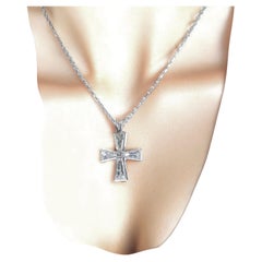 Cross with Fine Fancy cut Diamonds in Platinum on a fine antique diamond chain