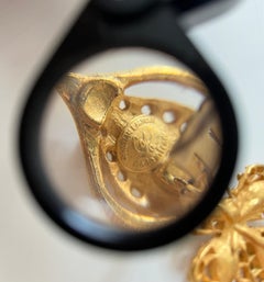 Cross witn zircon gold-toned earrings by CHRISTIAN LACROIX