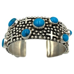 Bracciale in argento con croci e gocce di pioggia e turchese di Ronnie Willie
