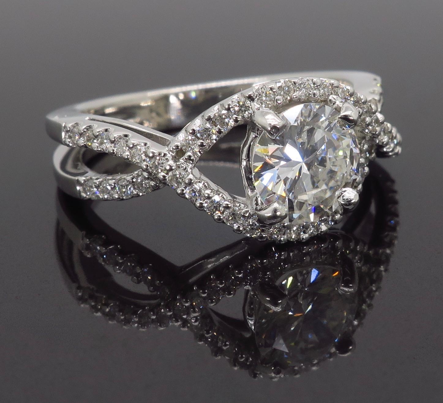 Women's Crossover Halo Diamond Engagement Ring Made in 14 Karat White Gold For Sale