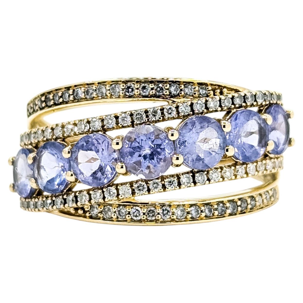 Bague croisée Tanzanite et diamant en or jaune 14k