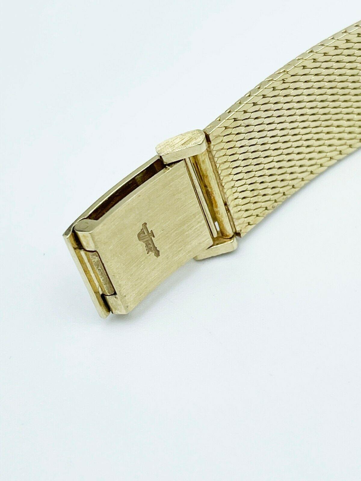 gold croton watch value