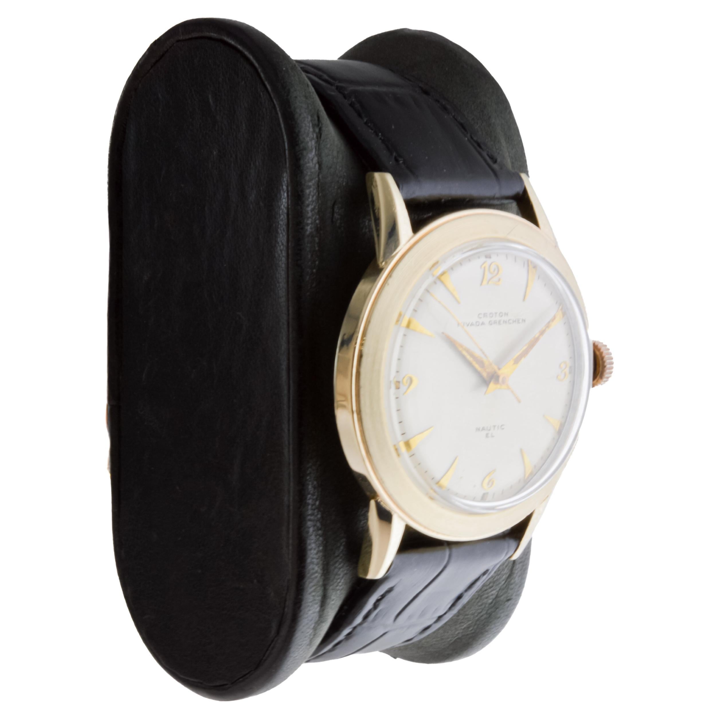 FACTORY / HOUSE: Croton Watch Company
STYLE / REFERENCE: Art Deco / Reference Nivada Grenchen
METAL / MATERIAL: Yellow Gold Filled 
CIRCA / YEAR: 1950's
DIMENSIONS / SIZE: Length 40mm X Diameter 33mm
MOVEMENT / CALIBER: Manual Winding / 17 Jewels /