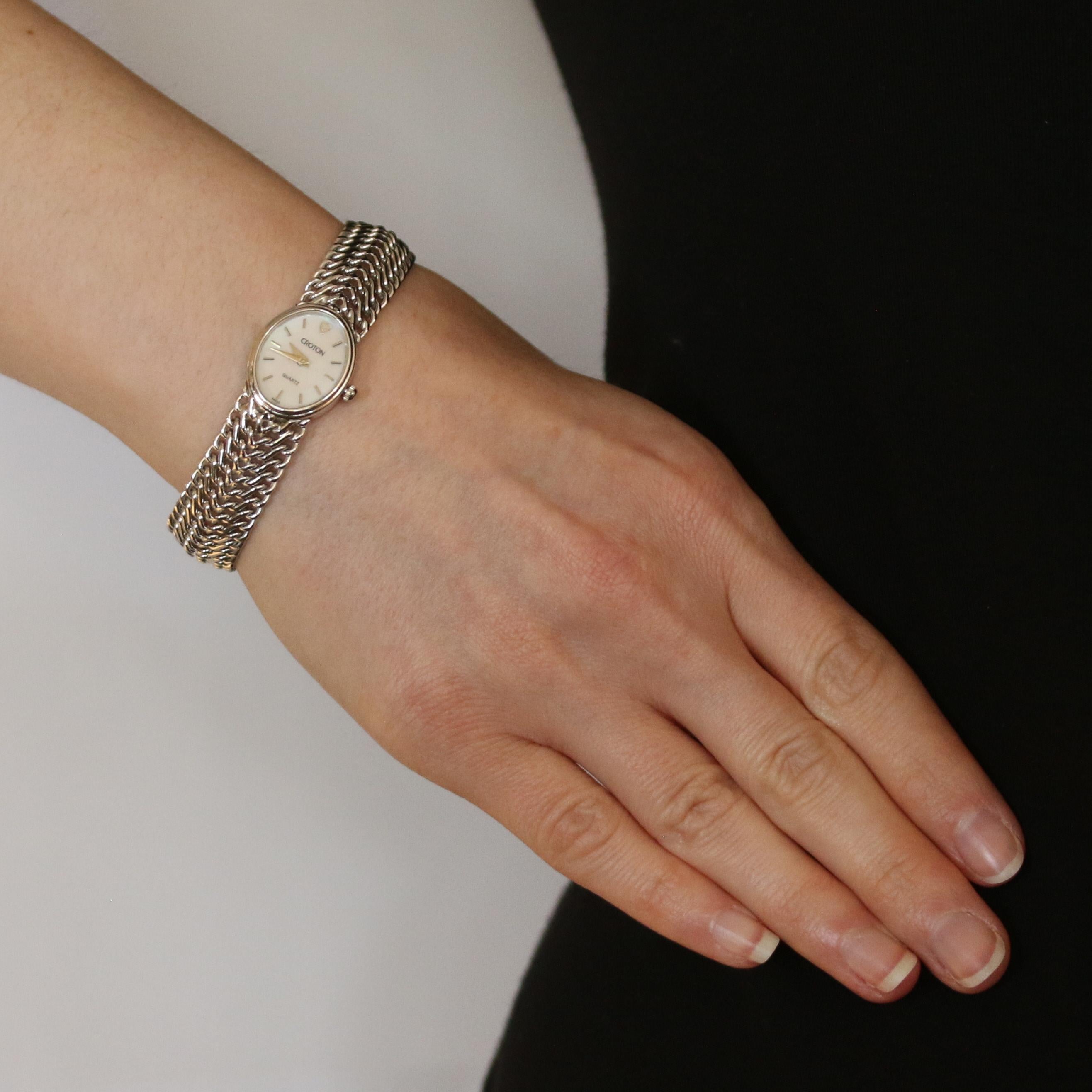 croton 14k gold watch
