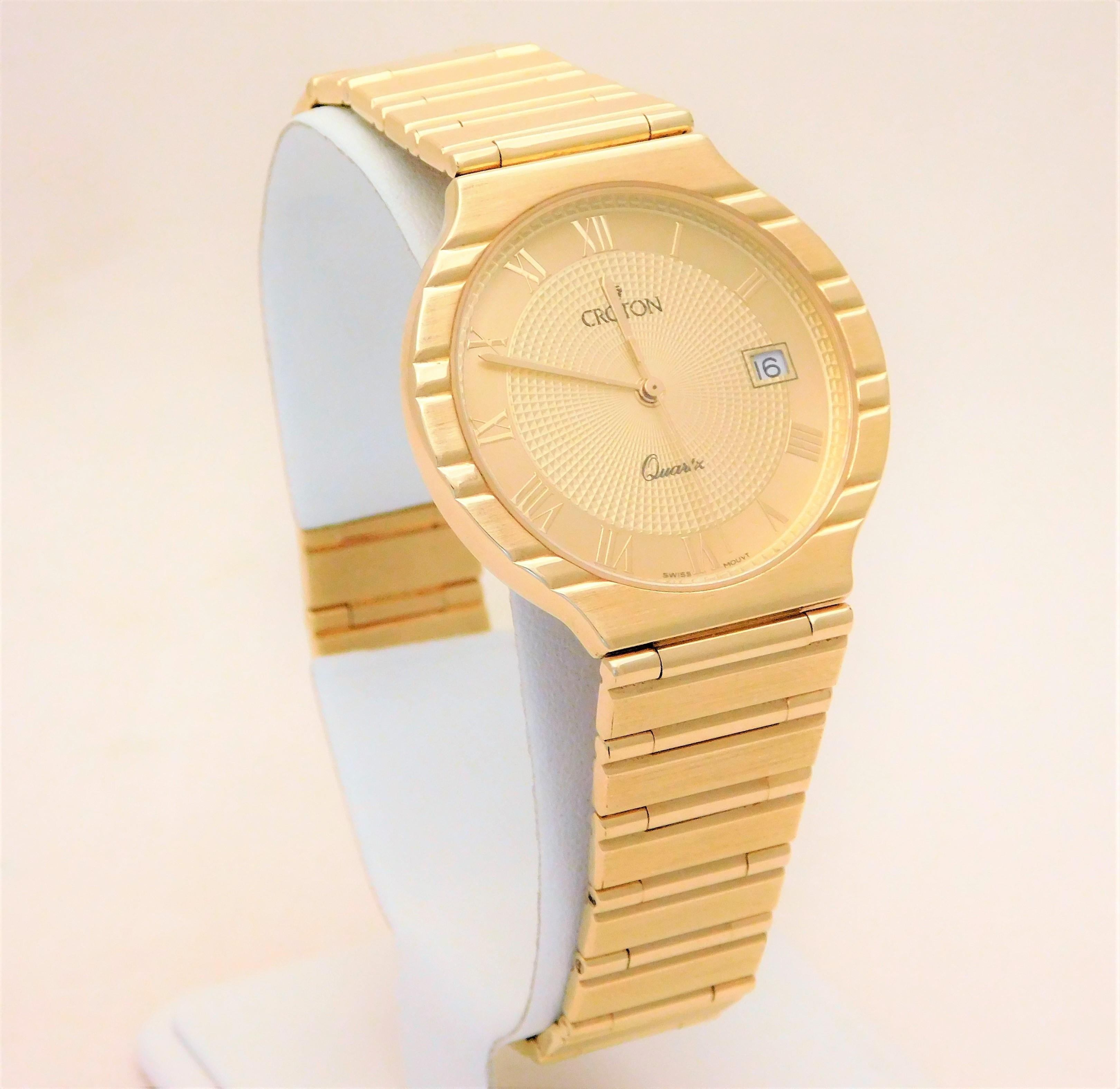 croton 18k gold watch