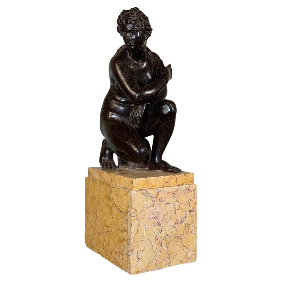 Crouching Venus, cast after the sculpture by Doidalsas of Bithynia, 19th century For Sale