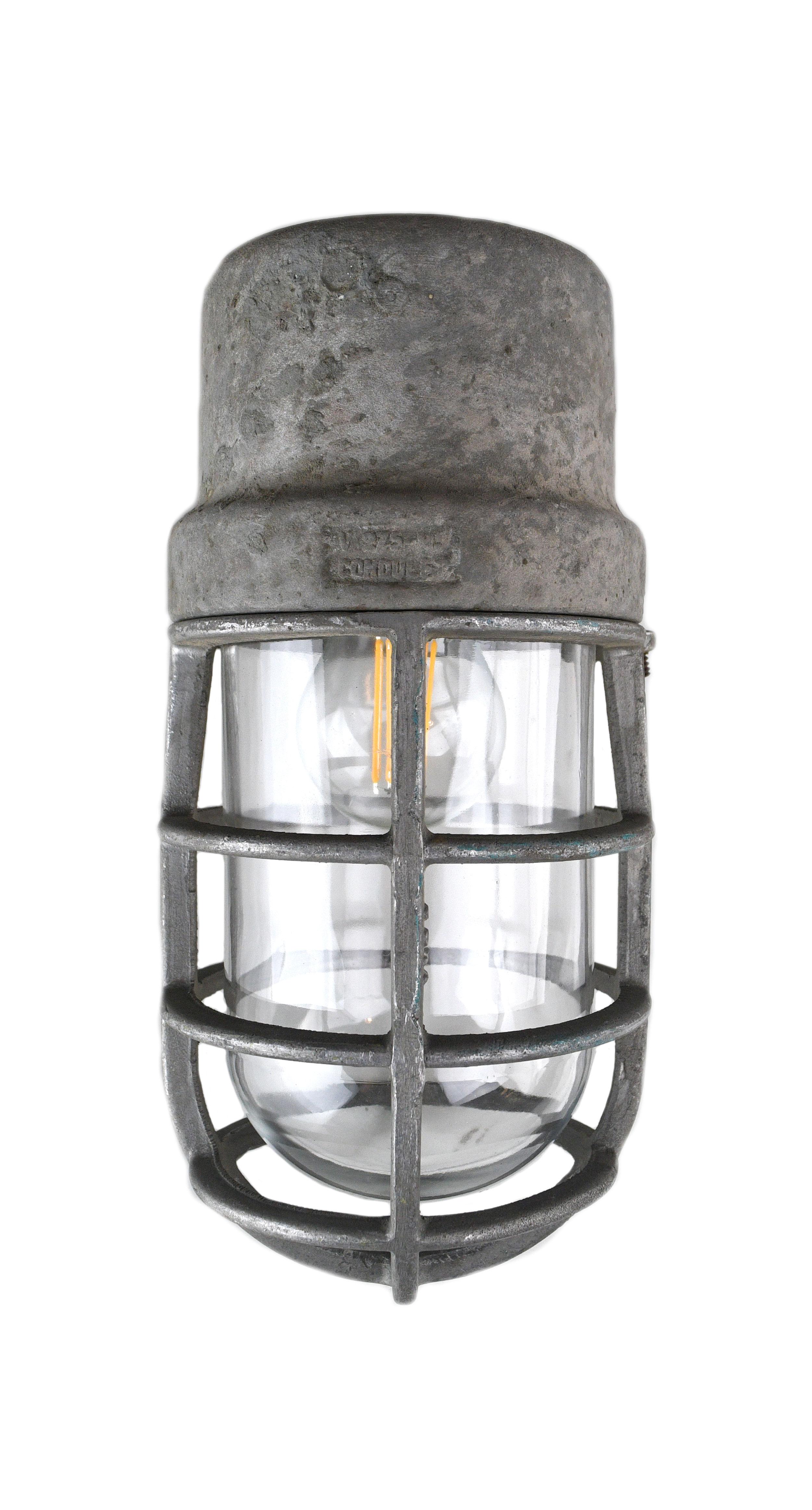 These Crouse Hinds sconces are made of metal and cast aluminum feature a Classic Industrial Design. 

Crouse-Hinds Electric Company, a manufacturer of high grade electrical specialties, was established in 1897 in Syracuse, New York. They later