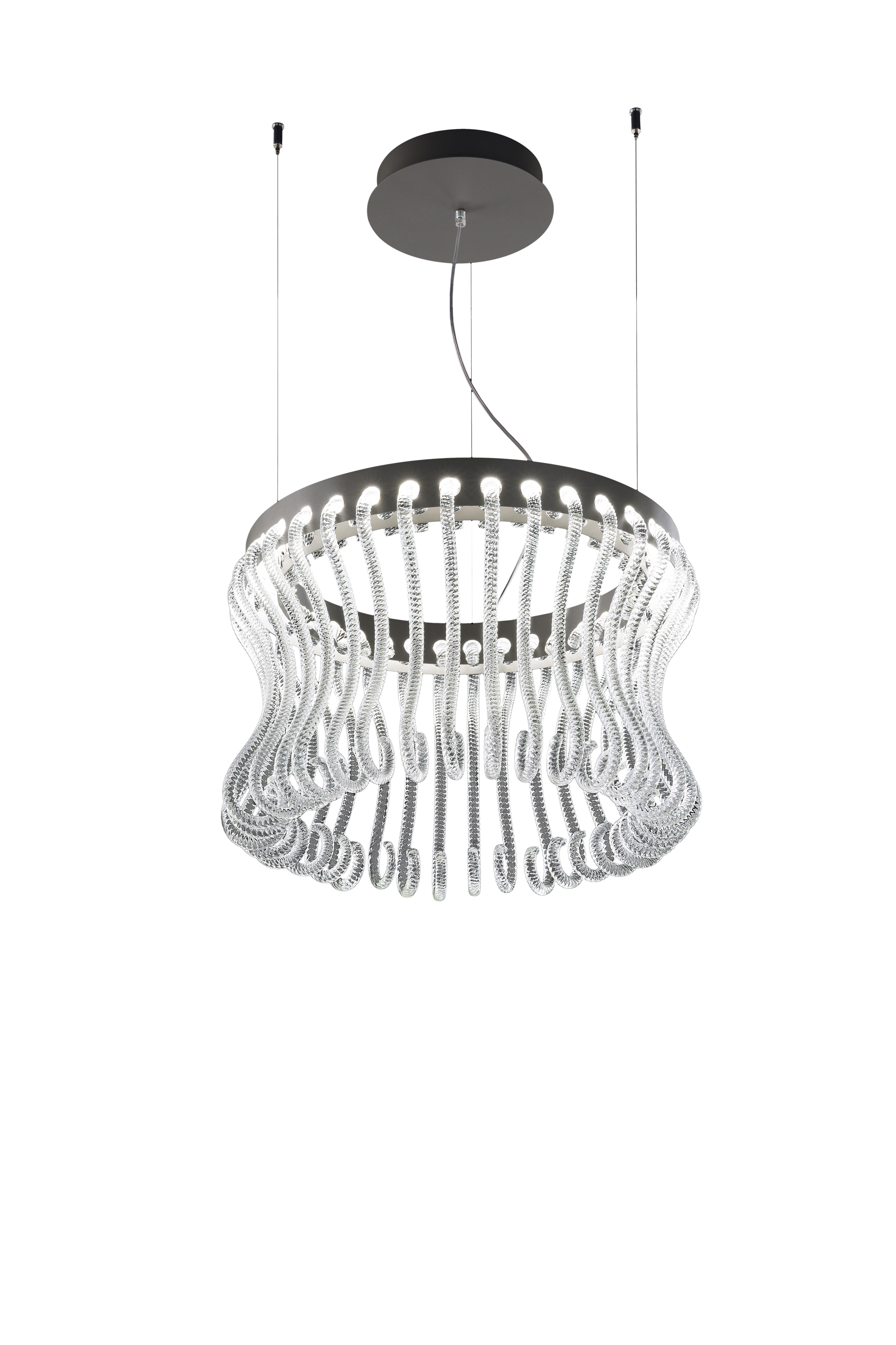 Originally designed in 2017 by Brian Rasmussen, here you are shown the Crown 7334 Suspension Lamp in Crystal Glass and Painted Grey Finish. The pastoral is a full-glass decorative element, characteristic of the Venetian chandelier which has become