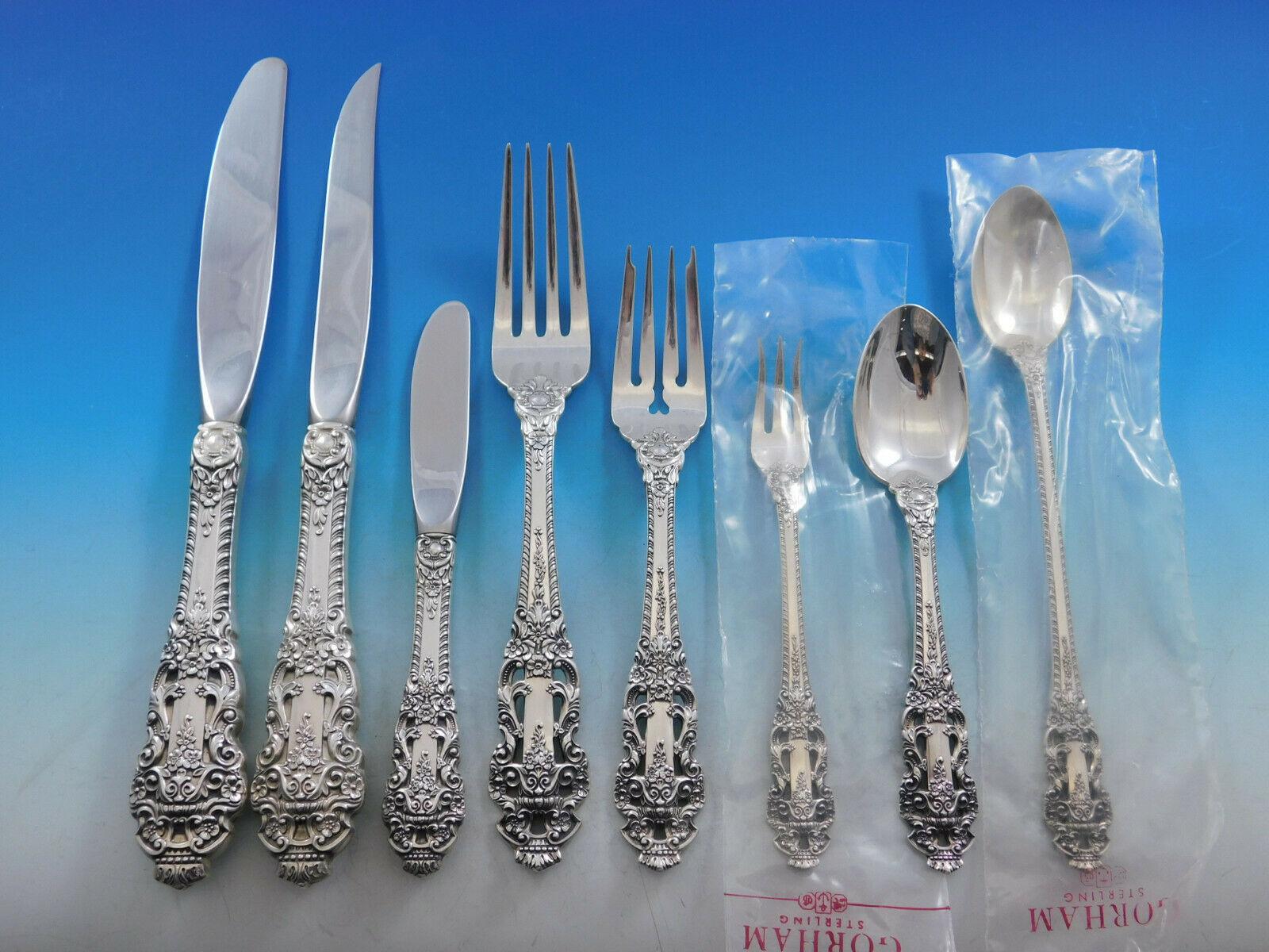 Monumental unused dinner size Crown Baroque by Gorham sterling silver flatware set - 107 pieces. Large, ornate, regal, and one of the most desirable patterns created by Gorham! This set includes:

12 large dinner knives, 9 7/8