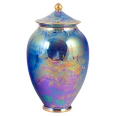 Crown Devon Fieldings. Porcelain lidded jar with iridescent blue-purple glaze.