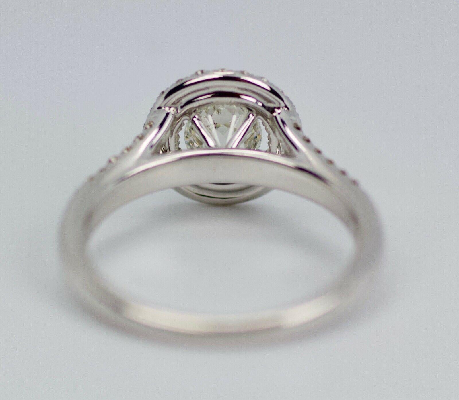 Modern Crown of Light 14 Karat White Gold Round Double Halo Engagement Ring
