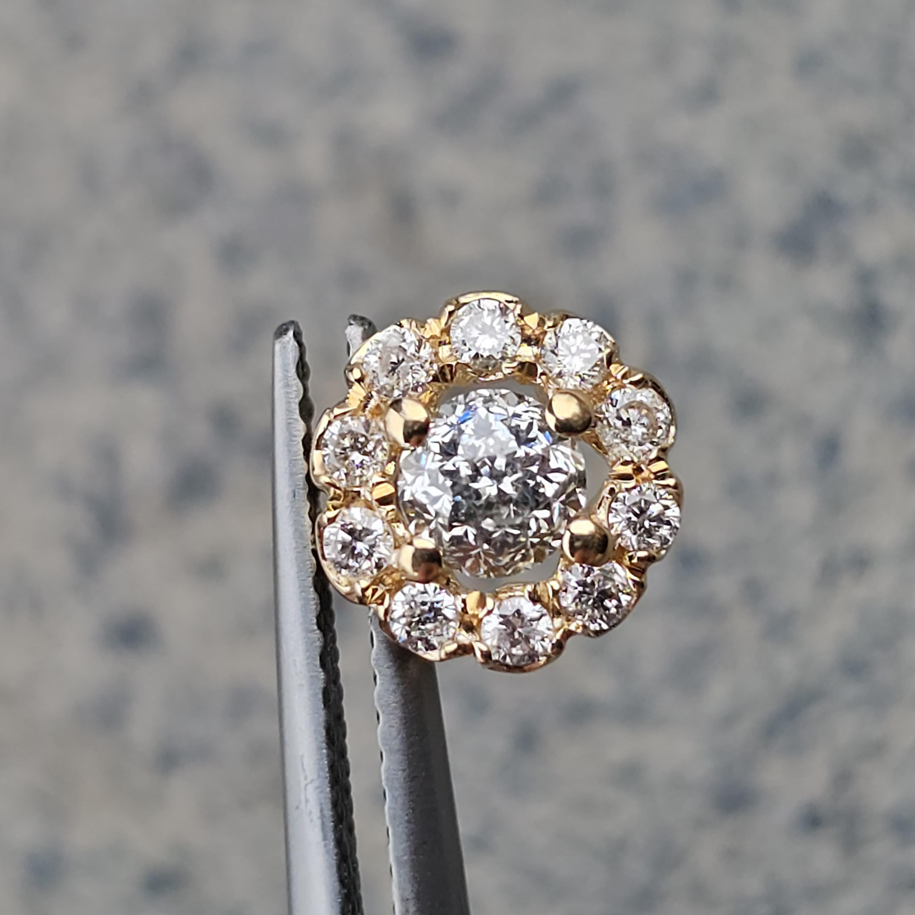 This exquisite Crown of Light charm pendant is a stunning addition to any jewelry collection. Crafted from 14k yellow gold, this piece features a dazzling arrangement of white diamonds, creating a captivating floral design.

More details:
Metal: 14k