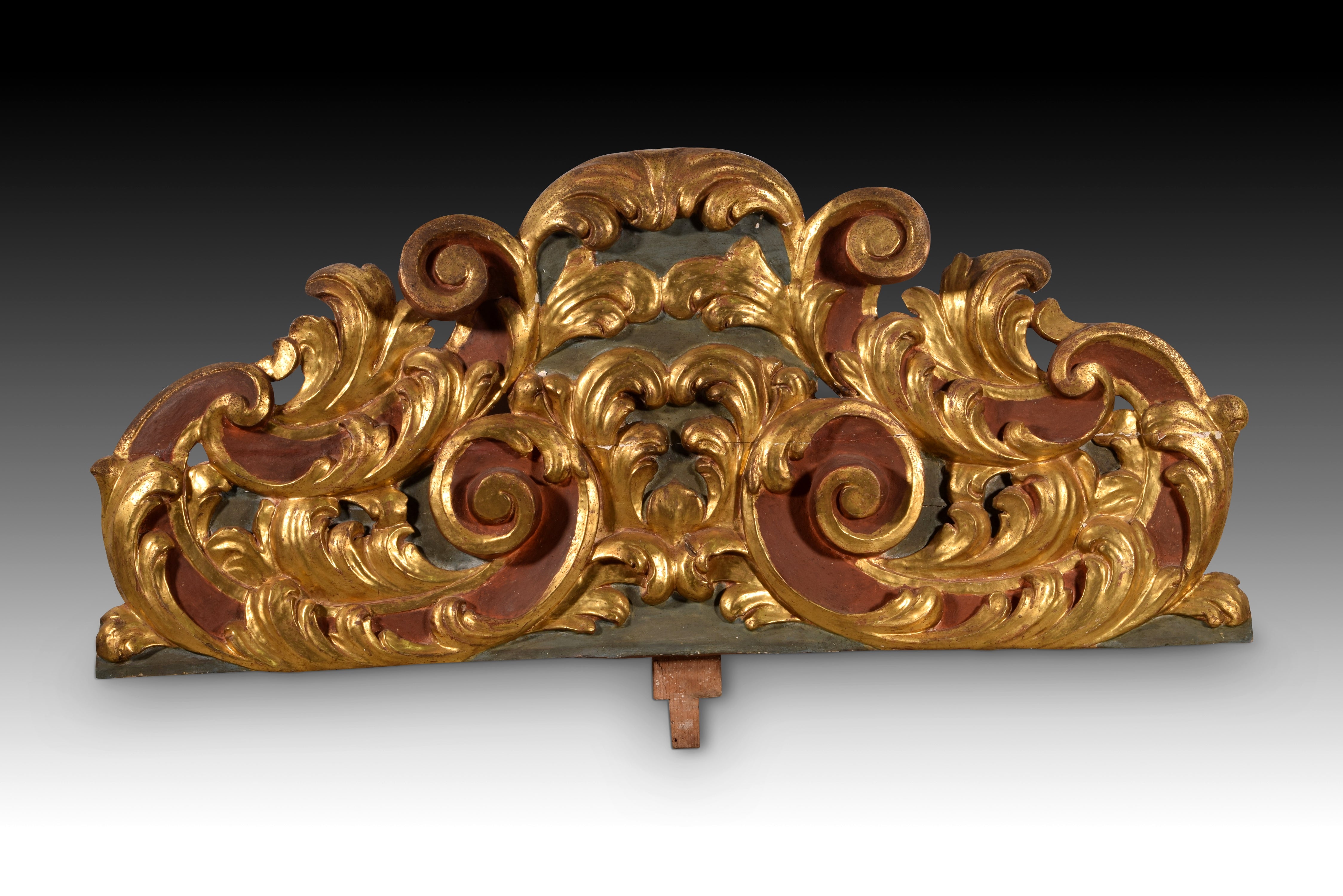 Auktion. Geschnitztes und polychromiertes Holz, 18. Jahrhundert.
Aus geschnitztem, polychromem und vergoldetem Holz, verziert mit einem leichten Relief auf der Basis von 
