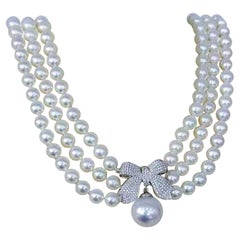【Crown Radiance】Aurora Akoya Pearl Triple-Strand Necklace with Diamond Bow Clasp