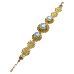 【Geometria scolpita】Bracciale di perle dei mari del sud in pizzo dorato Aurora