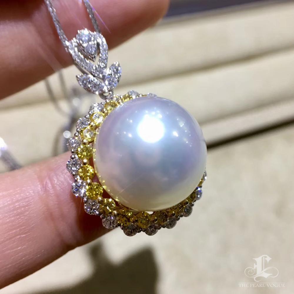 Ciondolo e anello con perle dei mari del sud e dado bianco e giallo. in vendita 1