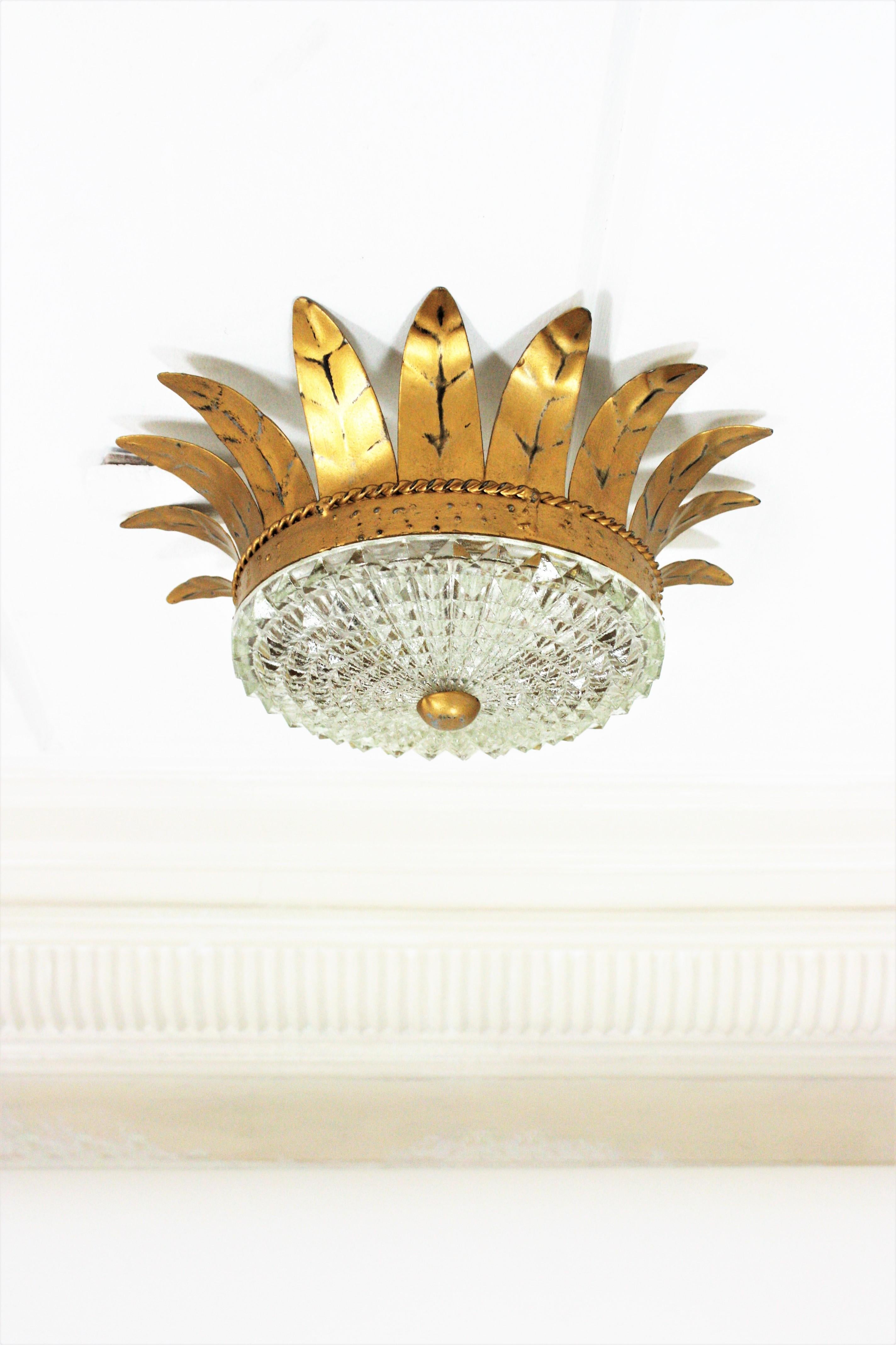 Metal Sunburst Crown Light Fixture in Gilt Iron and Glass, 1950s For Sale
