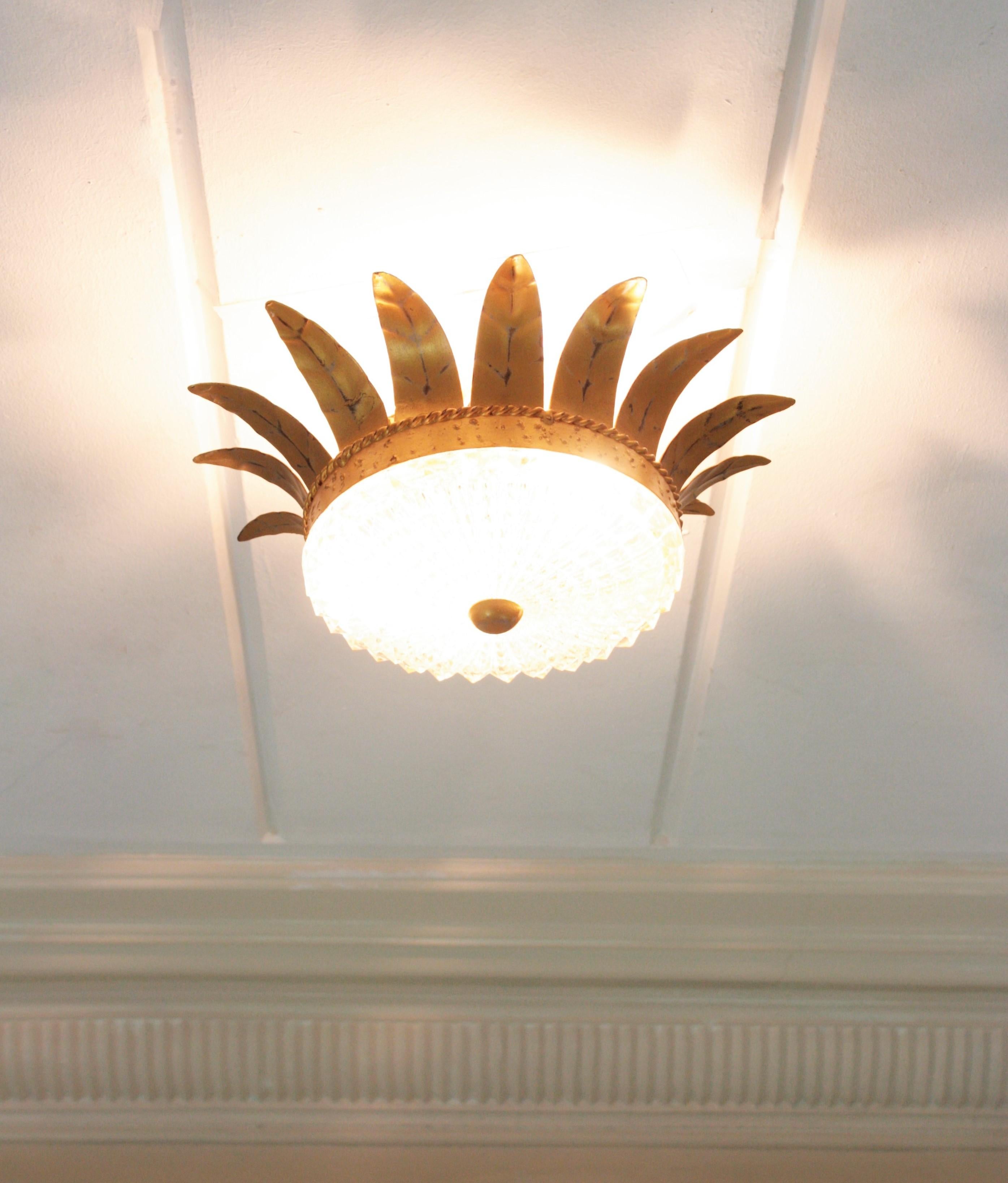 Neoclassical Sunburst Crown Light Fixture in Gilt Iron and Glass, 1950s For Sale