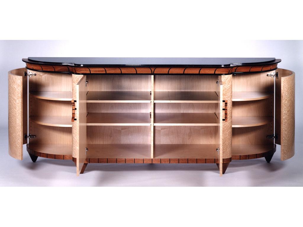 This crown 3 piece storage buffet/sideboard features natural birds eye maple doors with adjustable shelves. Detailed with natural mahogany detailing with black line detailing. Black granite top.

All our work is original, signed, dated, and made