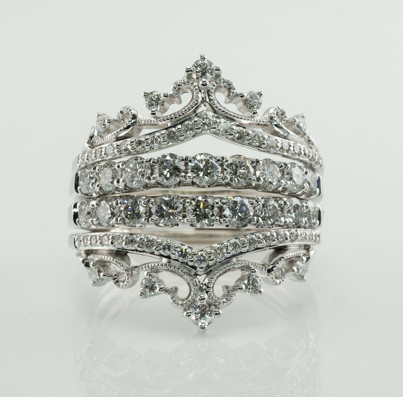 This estate ring is finely crafted in solid 14K White gold in the shape of a crown or tiara.
There are 66 round cut diamonds totaling 1.75 carat total weight for the ring.
The diamonds range from SI2 to I2 clarity and I color. 
The top of the ring