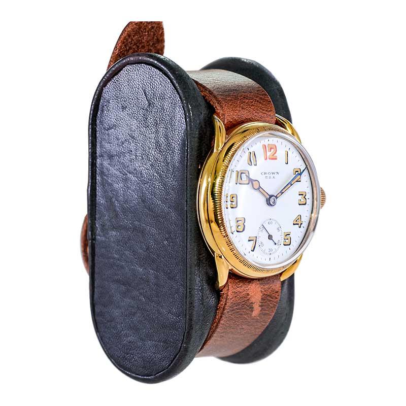 FACTORY / HOUSE: Crown Watch Company
STYLE / REFERENCE: Campaign Military Style 
METAL / MATERIAL: Gold Filled
CIRCA / YEAR: 1920's
DIMENSIONS / SIZE: Length 37mm X Diameter 32mm
MOVEMENT / CALIBER: Manual Winding / 7 Jewels 
DIAL / HANDS: Original