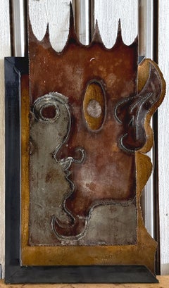 “Crowned in Silence”  Welded Steel Wall Sculpture Exploring Duality