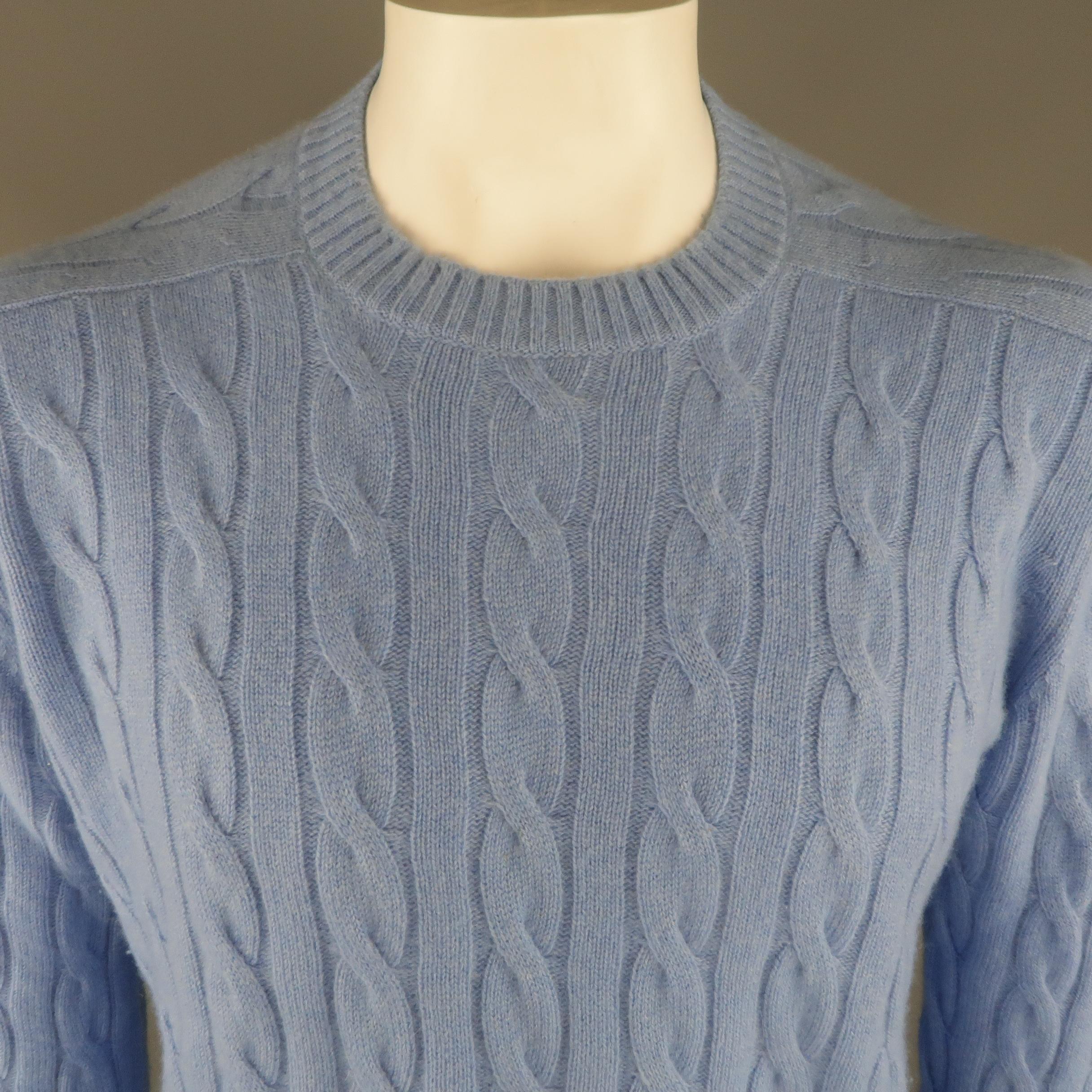 CRUCIANI pullover sweater comes in light blue cashmere cable knit with a crewneck and ribbed cuffs. Made in Italy.
 
Excellent Pre-Owned Condition.
Marked: IT 54
 
Measurements:
 
Shoulder: 19 in.
Chest: 50 in.
Sleeve: 26 in.
Length: 28 in.