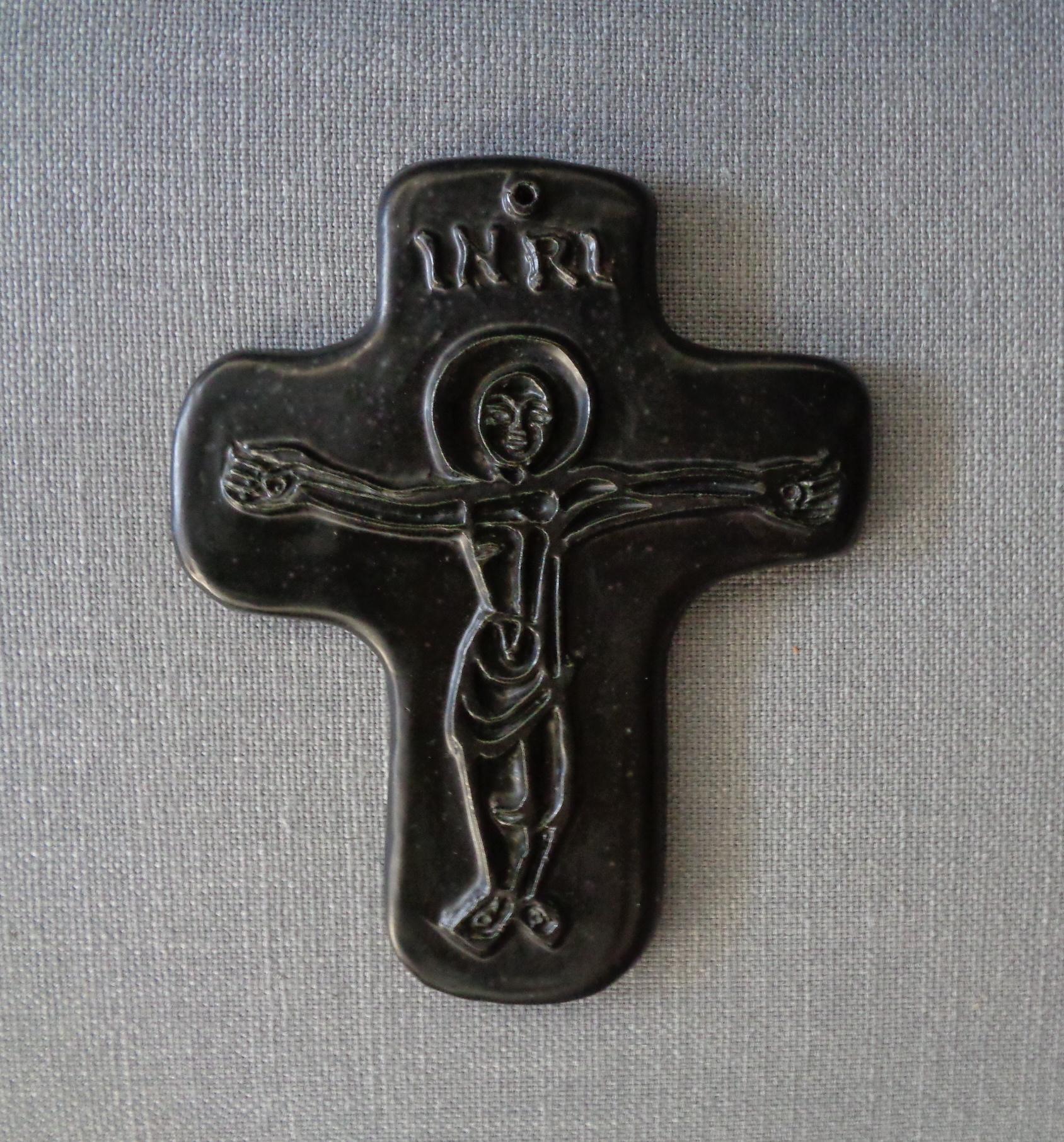 Made between 1942 and 1944, this crucifix is a very early piece from one of France's greatest ceramists. In 1942, Jouve had just escaped from Nazi imprisonment, and was hiding out in Provence, in an old potter's village. This was a ceramics-making