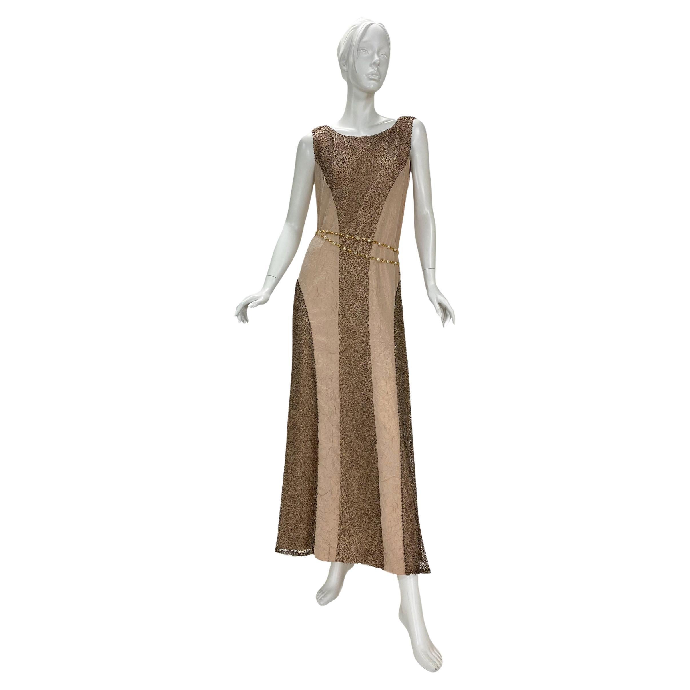 Cruise 2000 Vintage
Karl Lagerfeld for Chanel Embellished Dress
First Chanel Cruise Collection! Significant historical piece.
Details:
FR Size 40 – US 8
Silk Blend
Gold thread, beads
Condition:
Excellent condition (belt is not included)