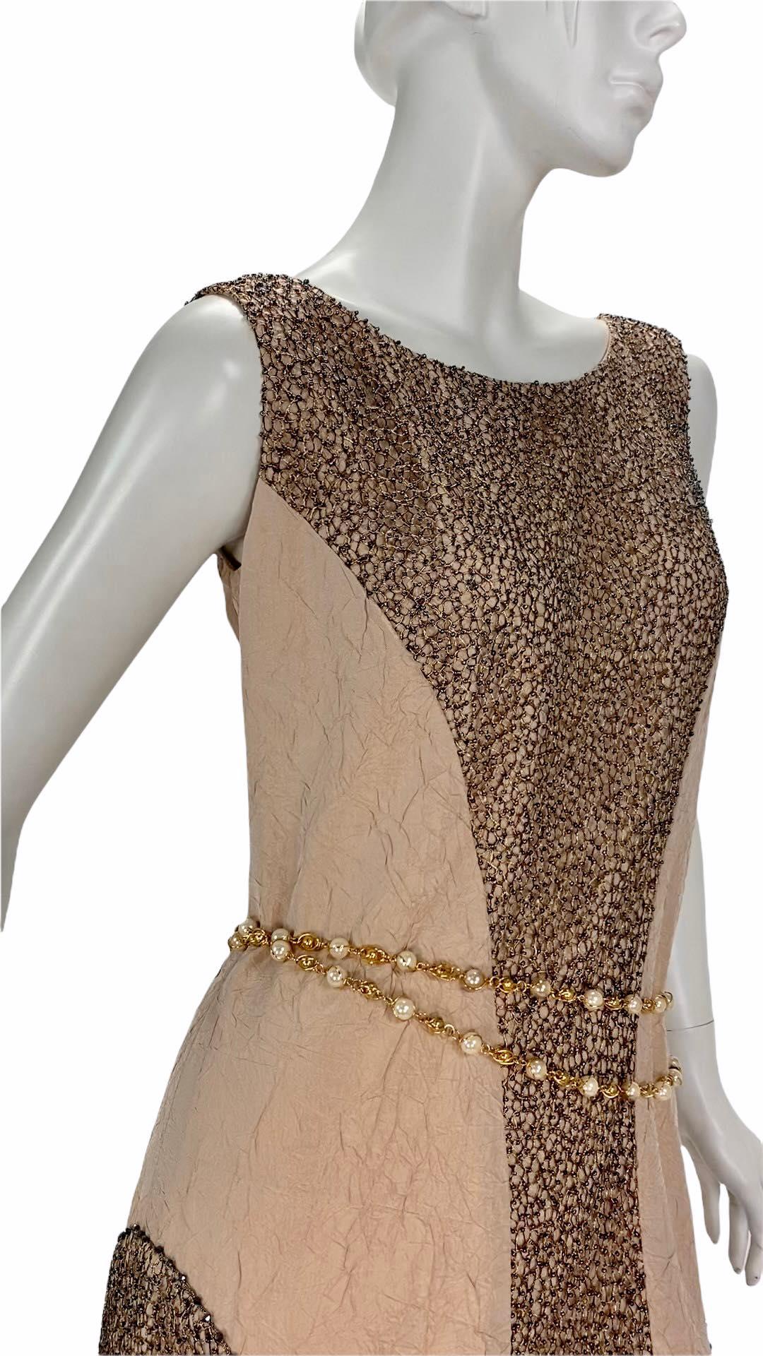 Cruise 2000  Vintage 
Karl Lagerfeld for Chanel Embellished Dress

First Chanel Cruise Collection! Significant historical piece.

FR Size 40 - US 8

Silk Blend

Gold thread, beads

Excellent condition (belt is not included)
Please see attached video