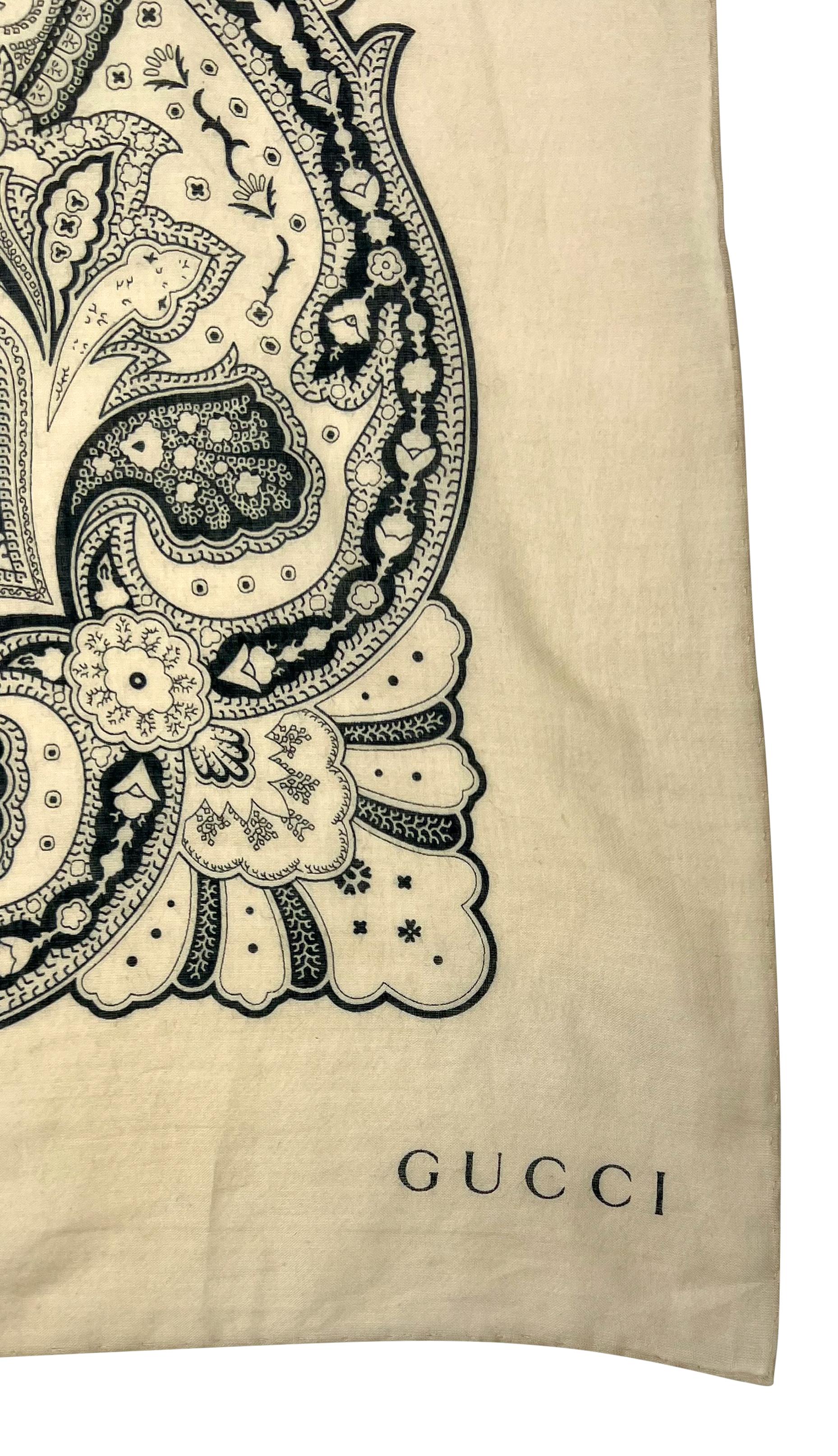 This oversized shawl pareo from Gucci by Tom Ford’s Cruise 2004 collection features an intricate beige and black paisley print.

Approximate measurements:
Length: 35