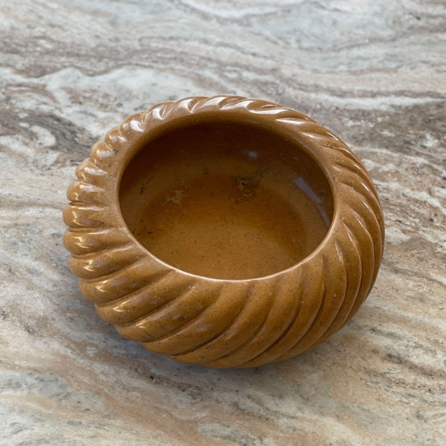 Cruller Bowl is a limited edition functional object d'art carved from a single cube of Jaisalmer Stone. Hand-finished by a growing artisan atelier in Rajasthan, India it is produced exclusively by Anastasio Home. Inspired by the famous French