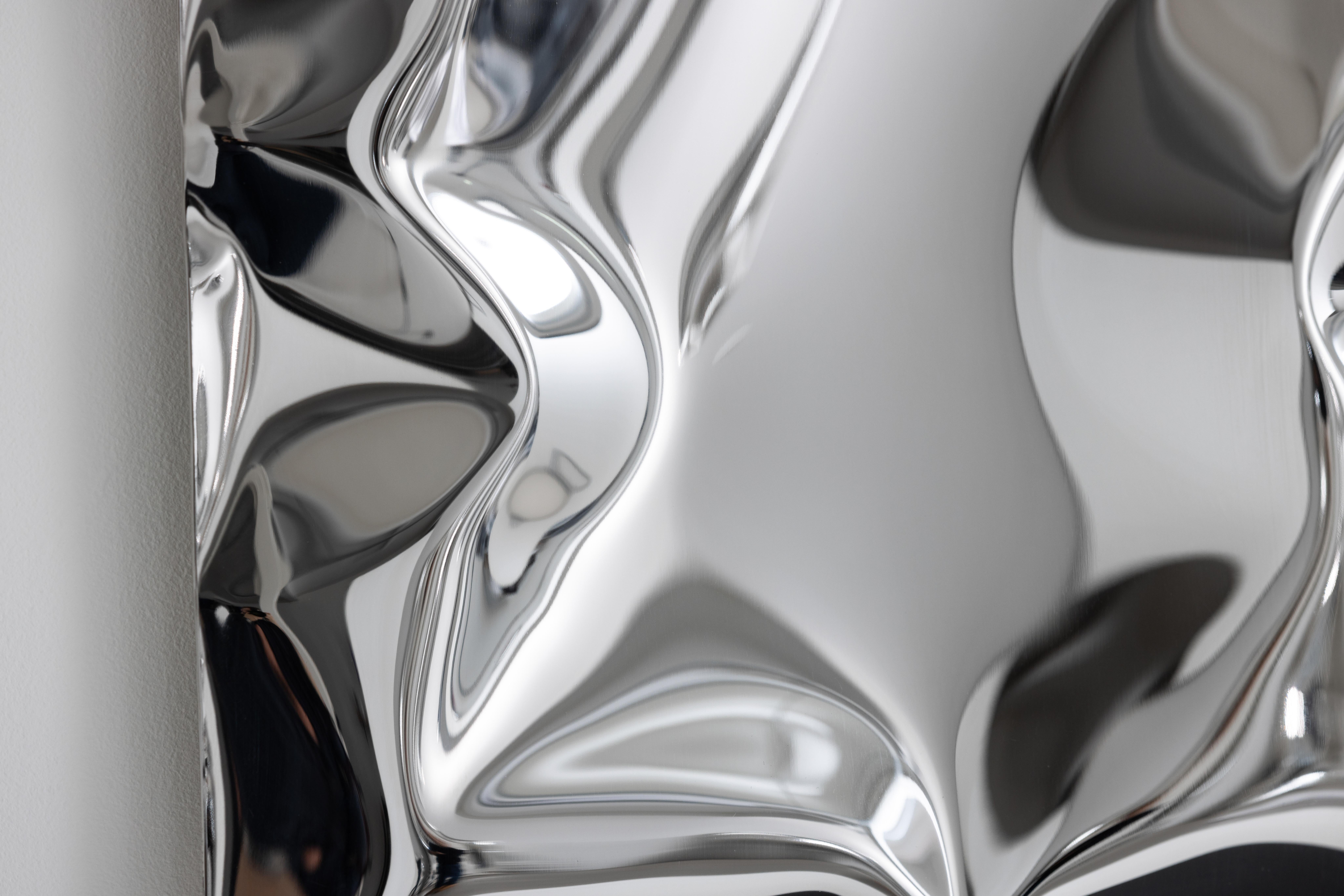 Polished 'Crush' inflated metal wall piece small, stainless steel For Sale