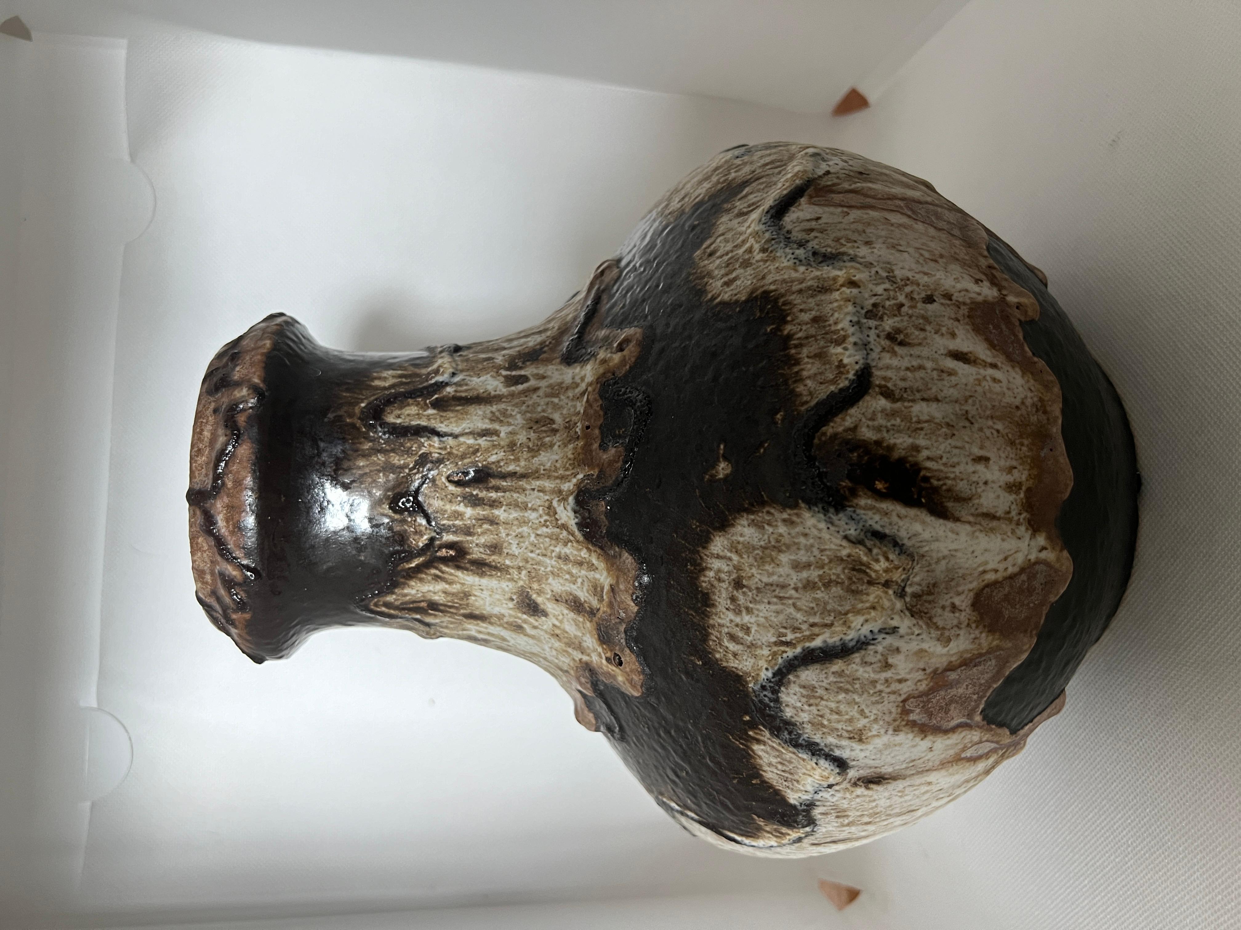 Foamy cream and brown German Fat Lava Pitcher, 1960s
Made by Scheurich, West Germany. 
Base is embossed in ceramic Scheurich Keramik West Germany.  With original paper sticker of Raymor, the U.S. importer
No chips, cracks or repairs.