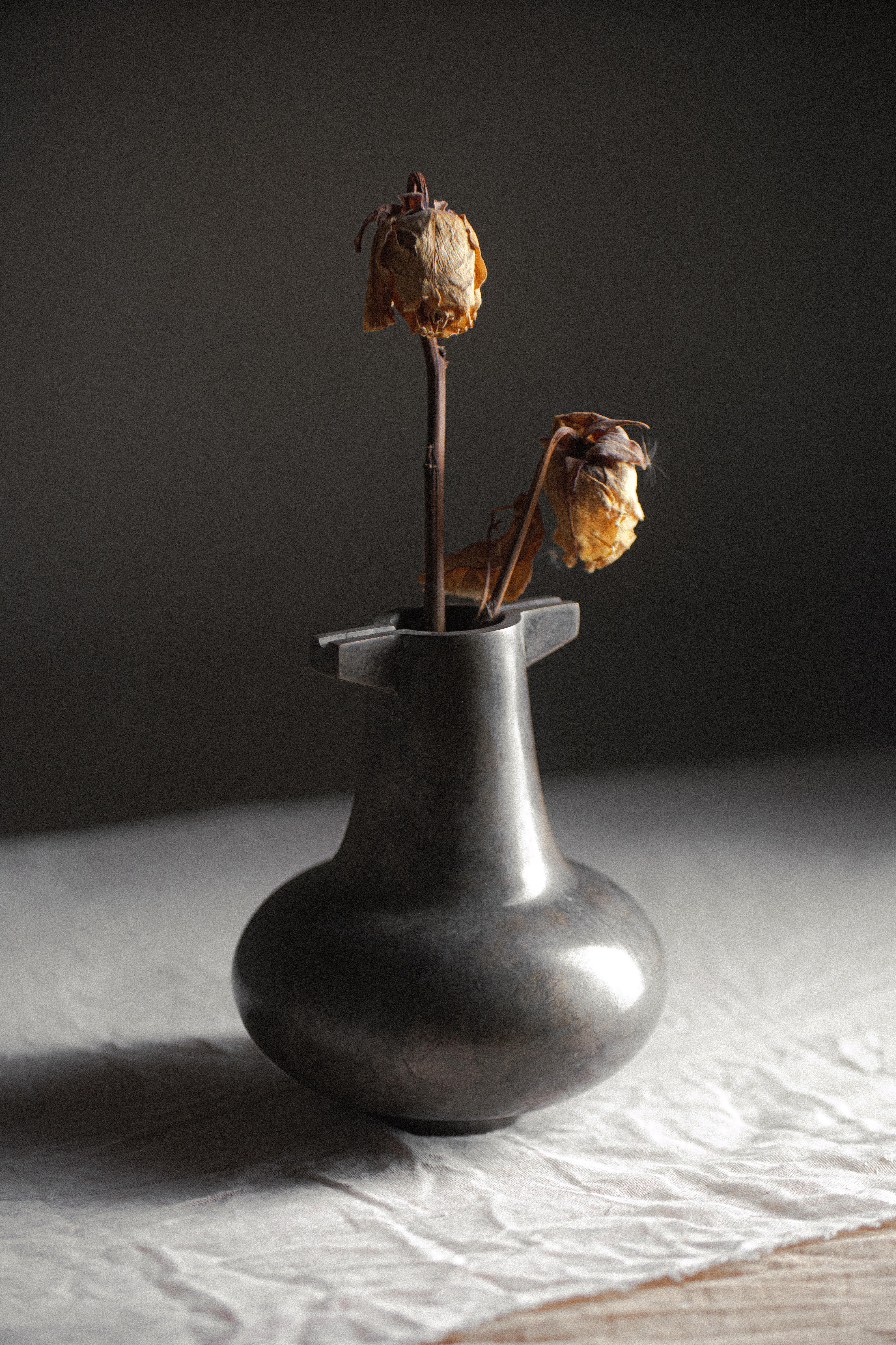 Crypt Bulb Vase by Atelier ACM
Dimensions: D 14 x W 14 x H 16 cm.
Materials: Bronze, silver nitrate patina.

Our collection stands as a reaction against the mass-produced world we live in where people no longer value objects, advocating for a return