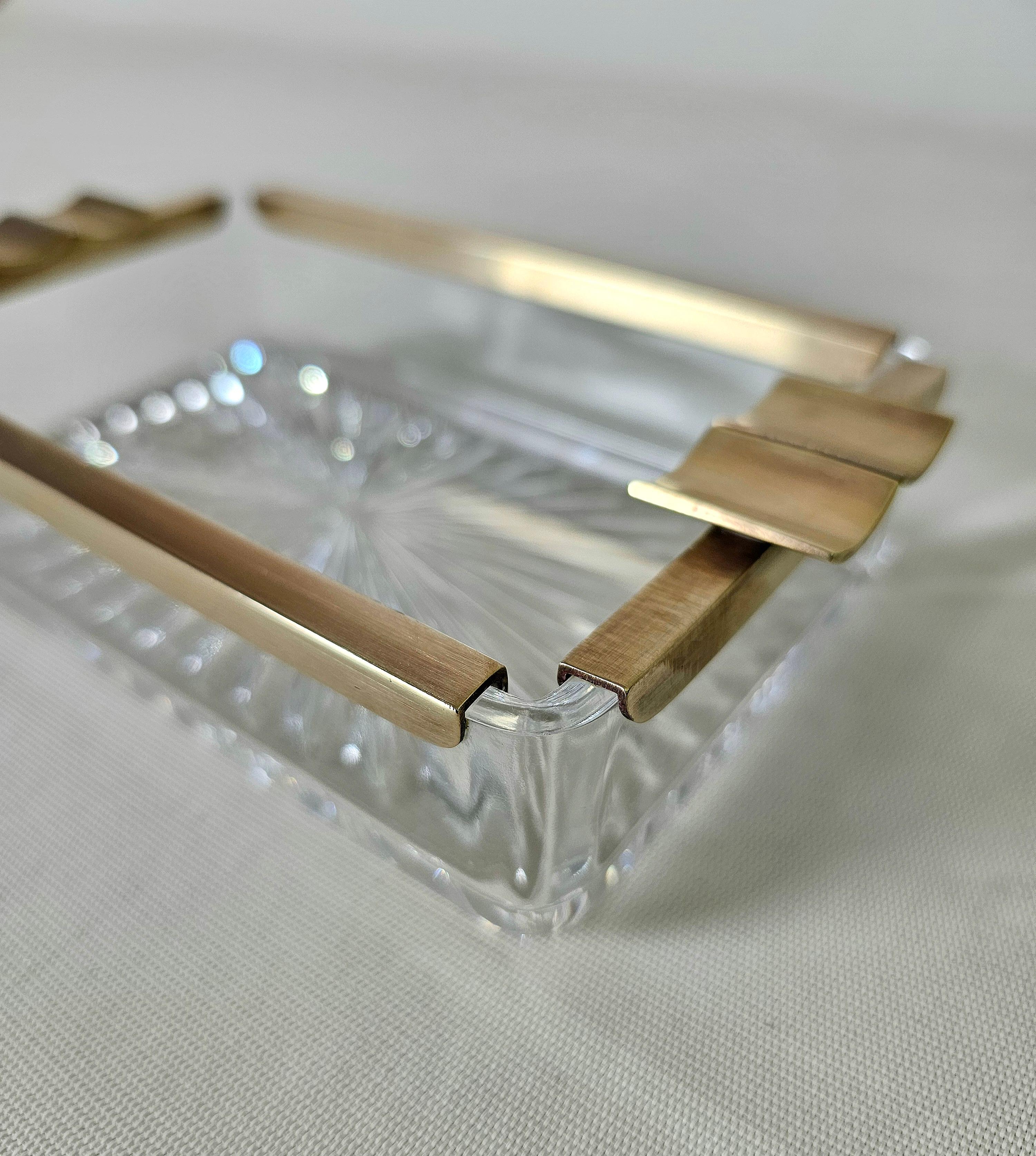 Elegant, rare of a kind, crystal ashtray with brass embellishment. Italy 1950s. Recommended piece

Weight: 770 grams

Note: We try to offer our customers an excellent service even in shipments all over the world, collaborating with one of the best